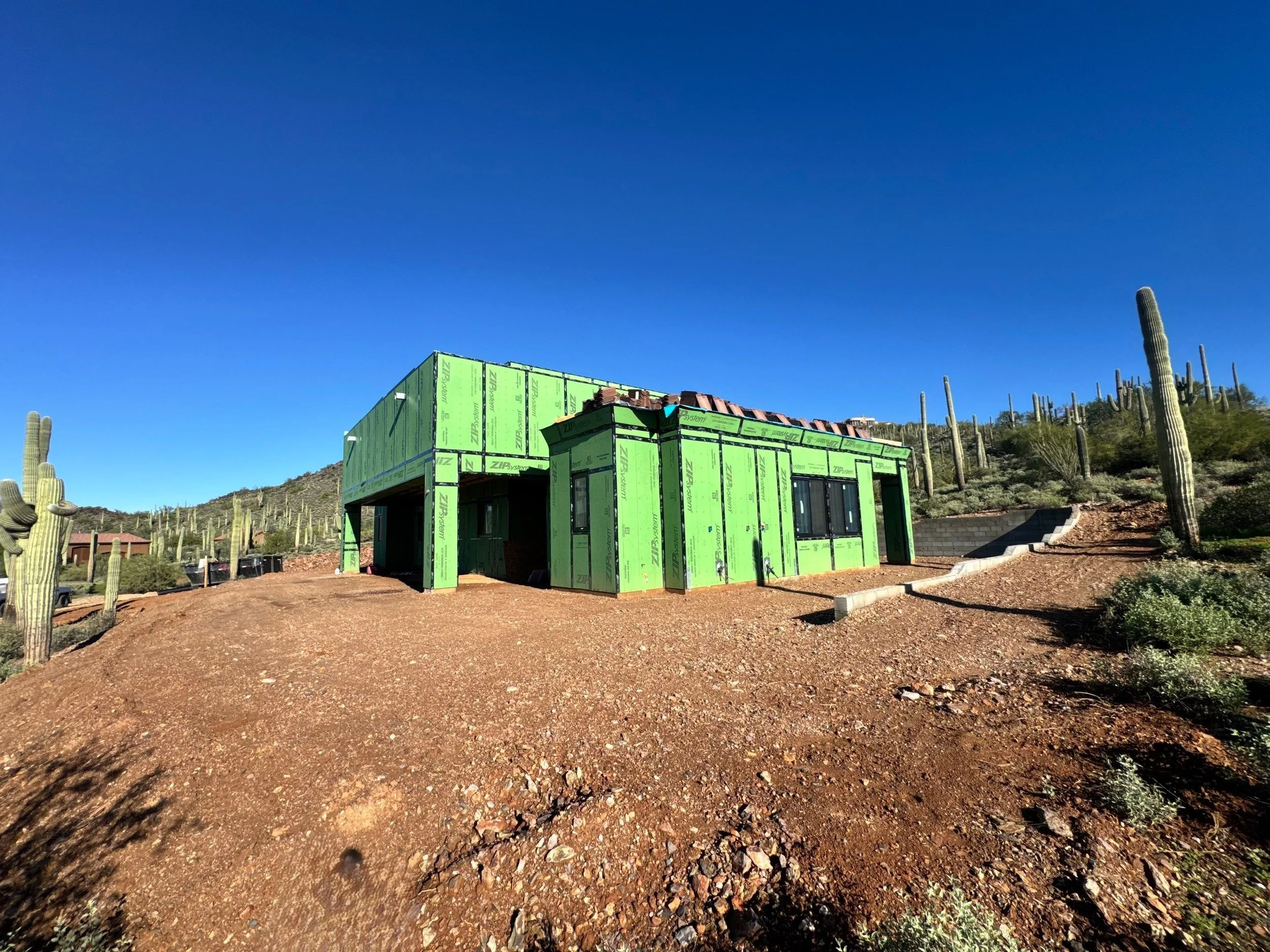 Residential stucco installation on a single-family home in the Phoenix metro area by Venetian Plastering.
