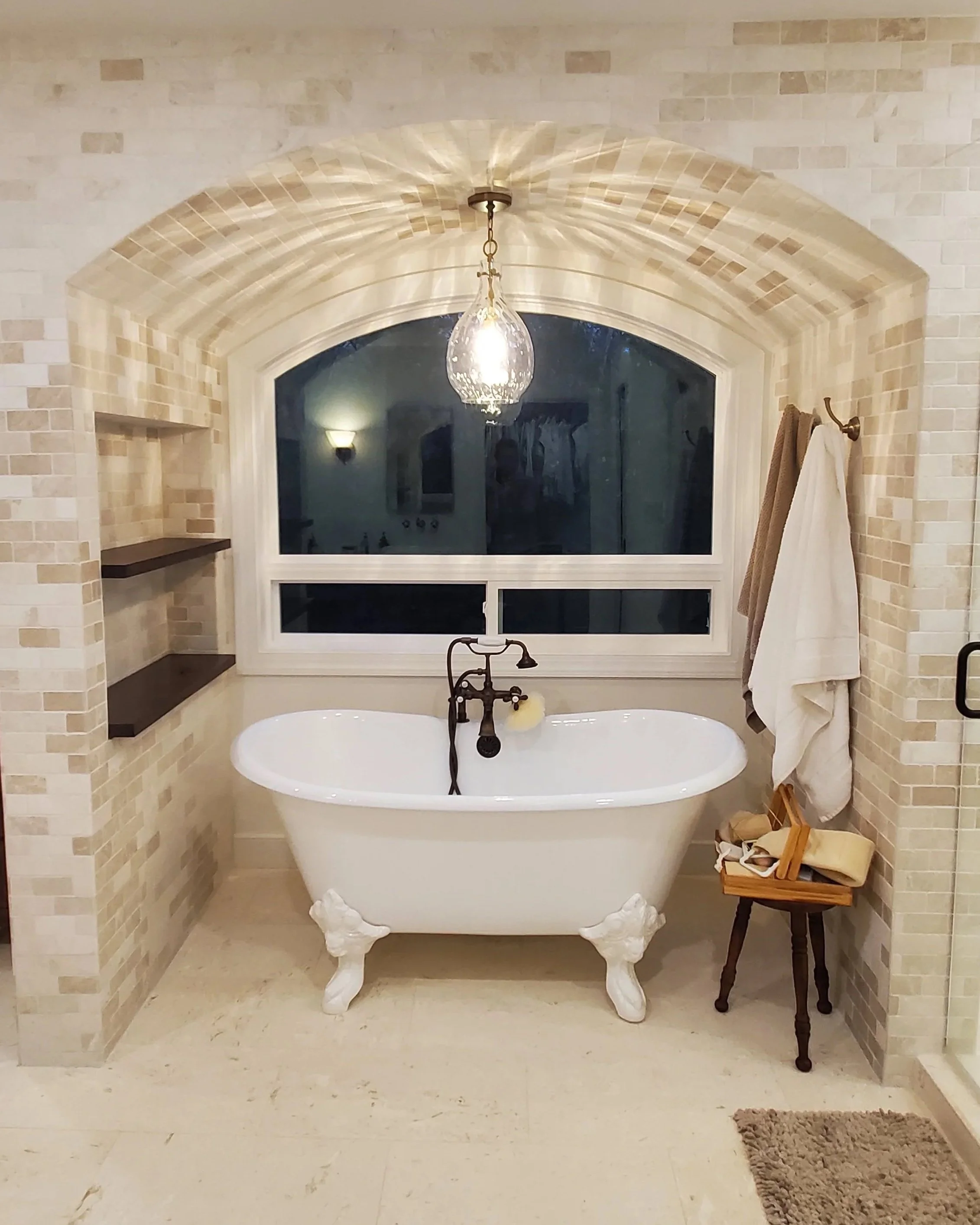 JBH+Wexford+Project+Primary+Bath+Custom+Brick+Arch.jpg