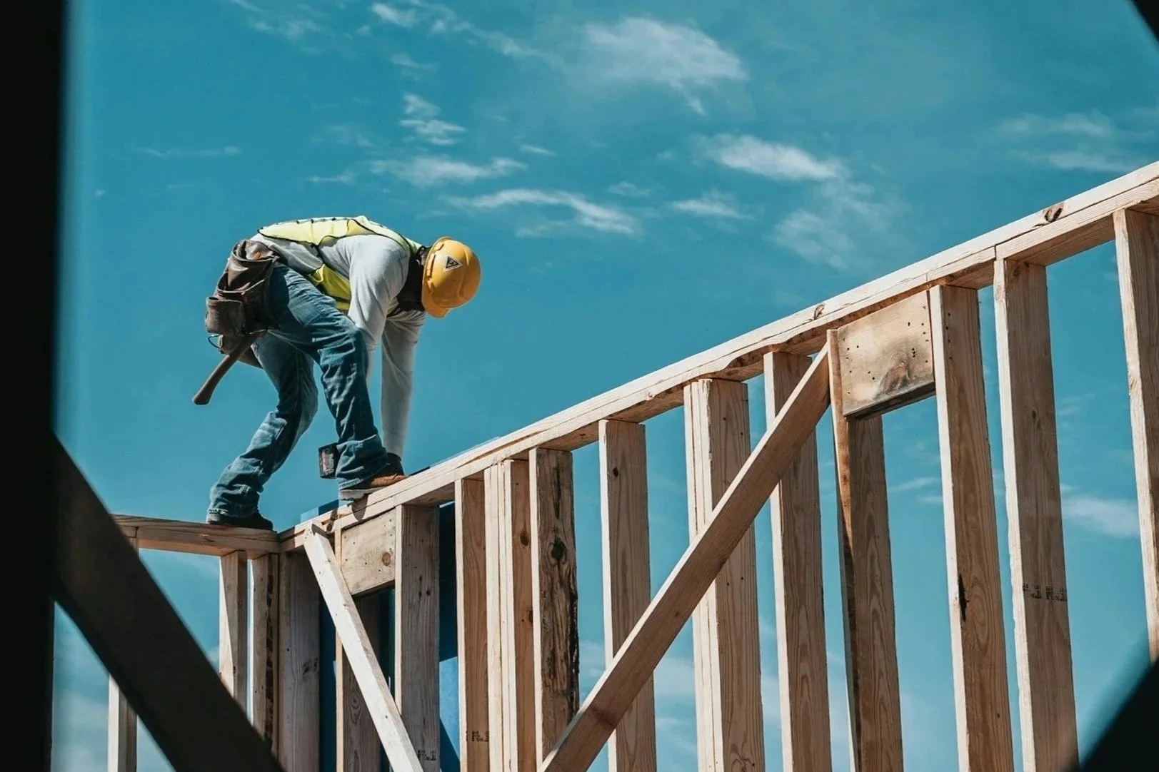 A construction worker | part of Jewel Box Homes process of Design.Develop.Deliver.