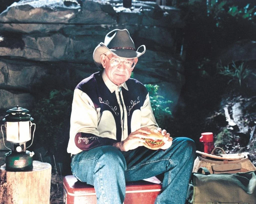 Dave Thomas in a cowboy outfit for a Wendy's commercial