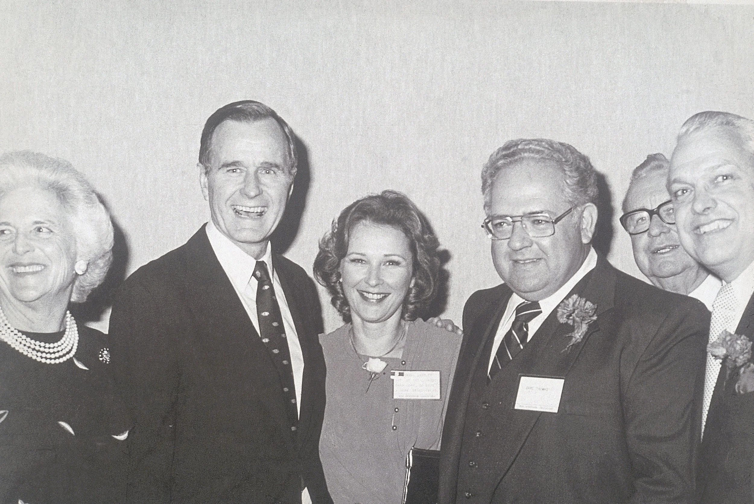 Dave Thomas, Founder of Wendy's, with President George H. Bush and First Lady Barbara Bush