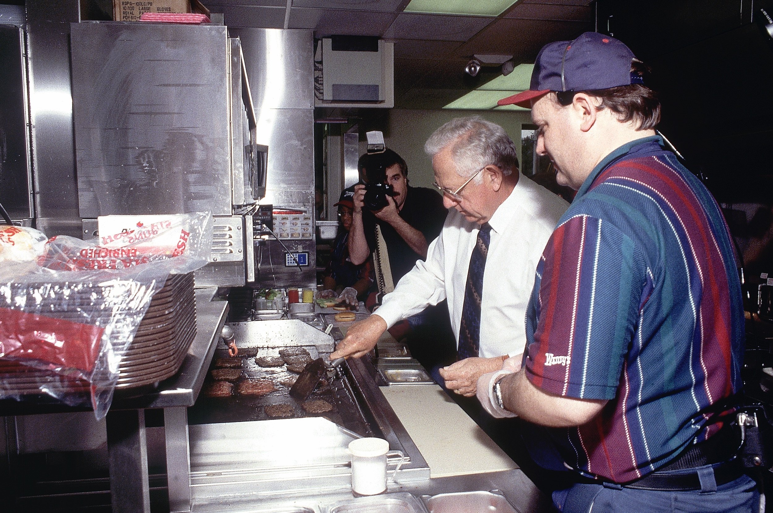 Dave Thomas, Founder of Wendy's, working on a grill