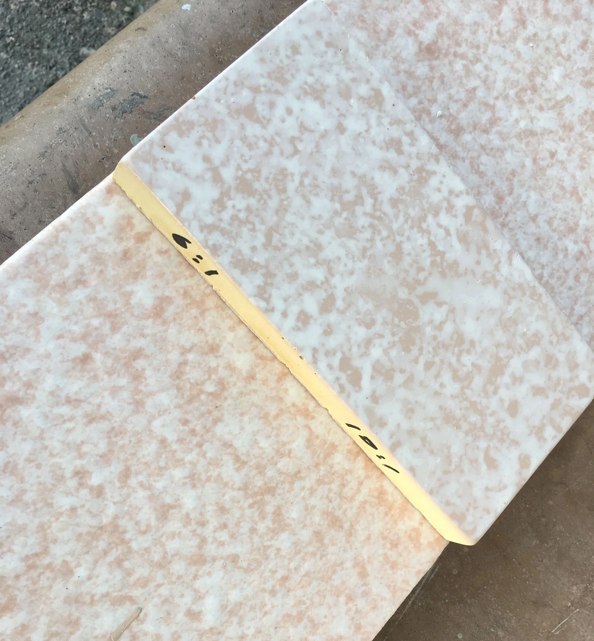 In-process terra cotta glaze development on GFRC sample tiles.