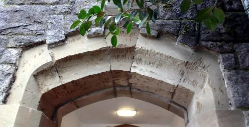 Original carved Tenino sandstone showing significant deterioration.