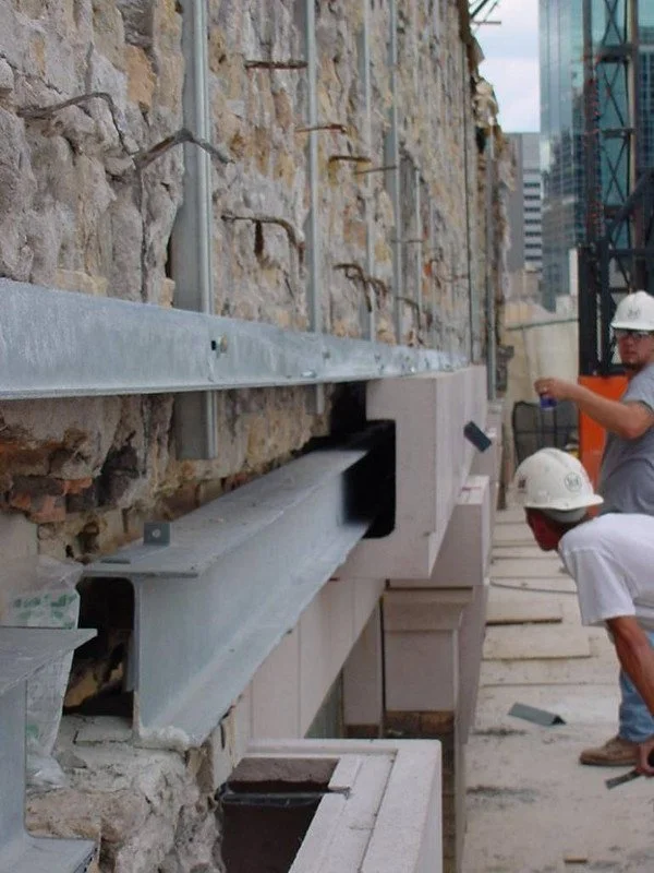 Installation of GFRC replacement parts and the attachment system developed by the ACI Studios team.