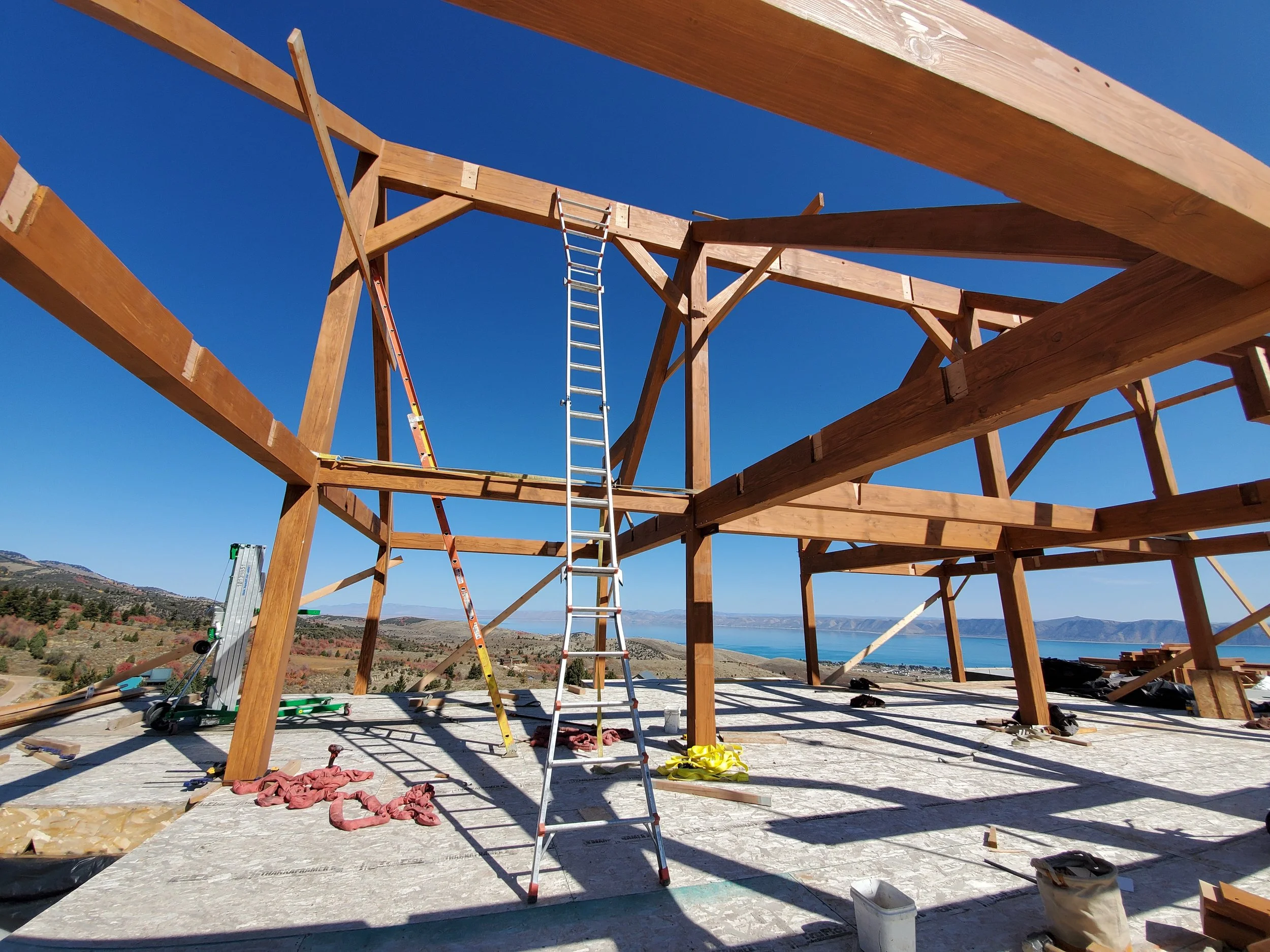 Construction site of our timber frames being installed with our team onsite. 