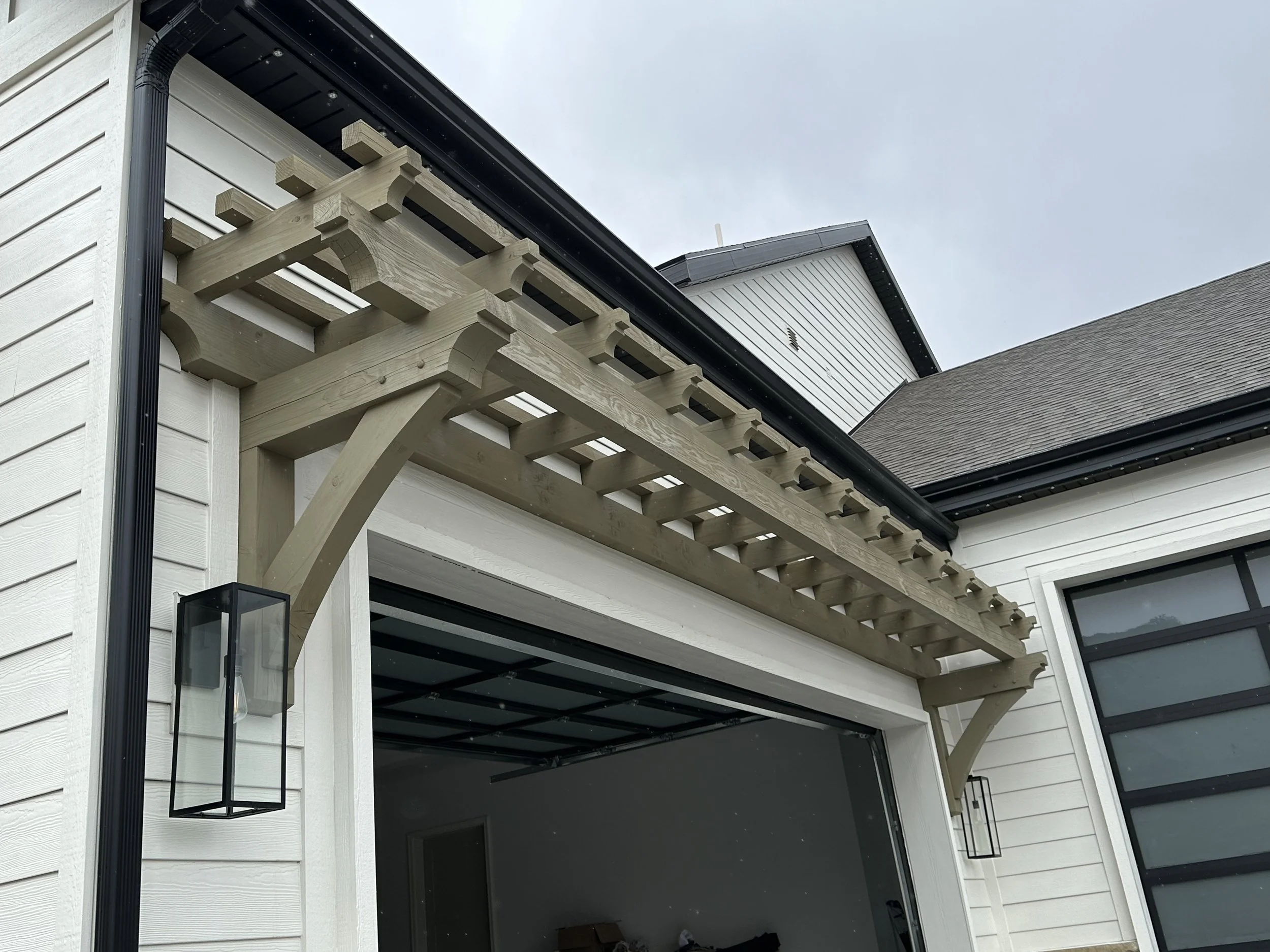 Modern Green Truss for side garage entry. 