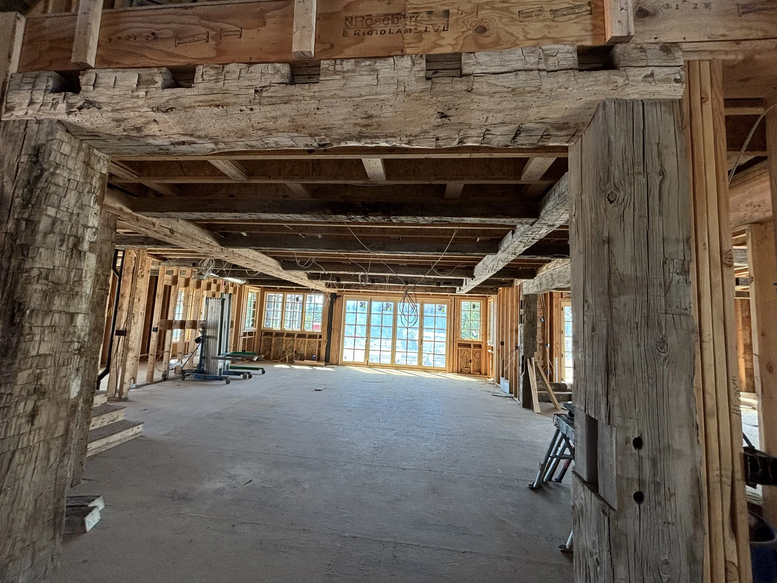 Interior of a house under construction, showing our exposed refurnished timber beams, being used on this project. 