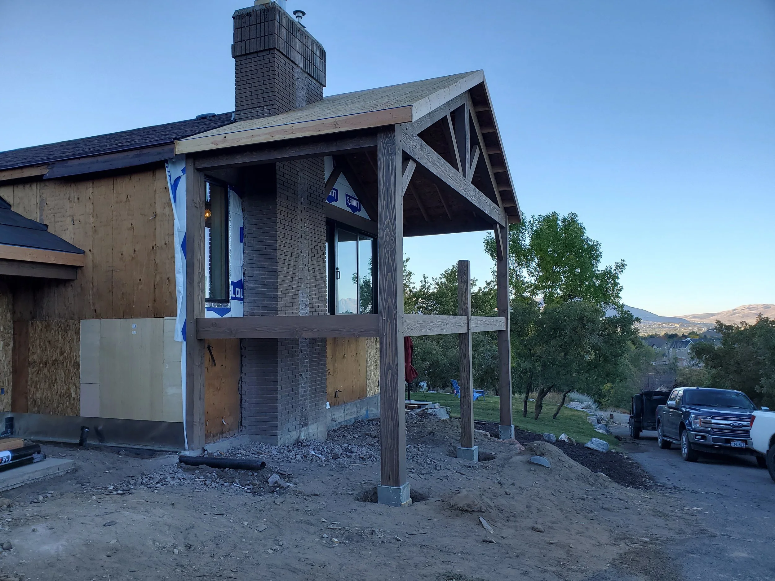 Timber frame and deck in process of being installed. 