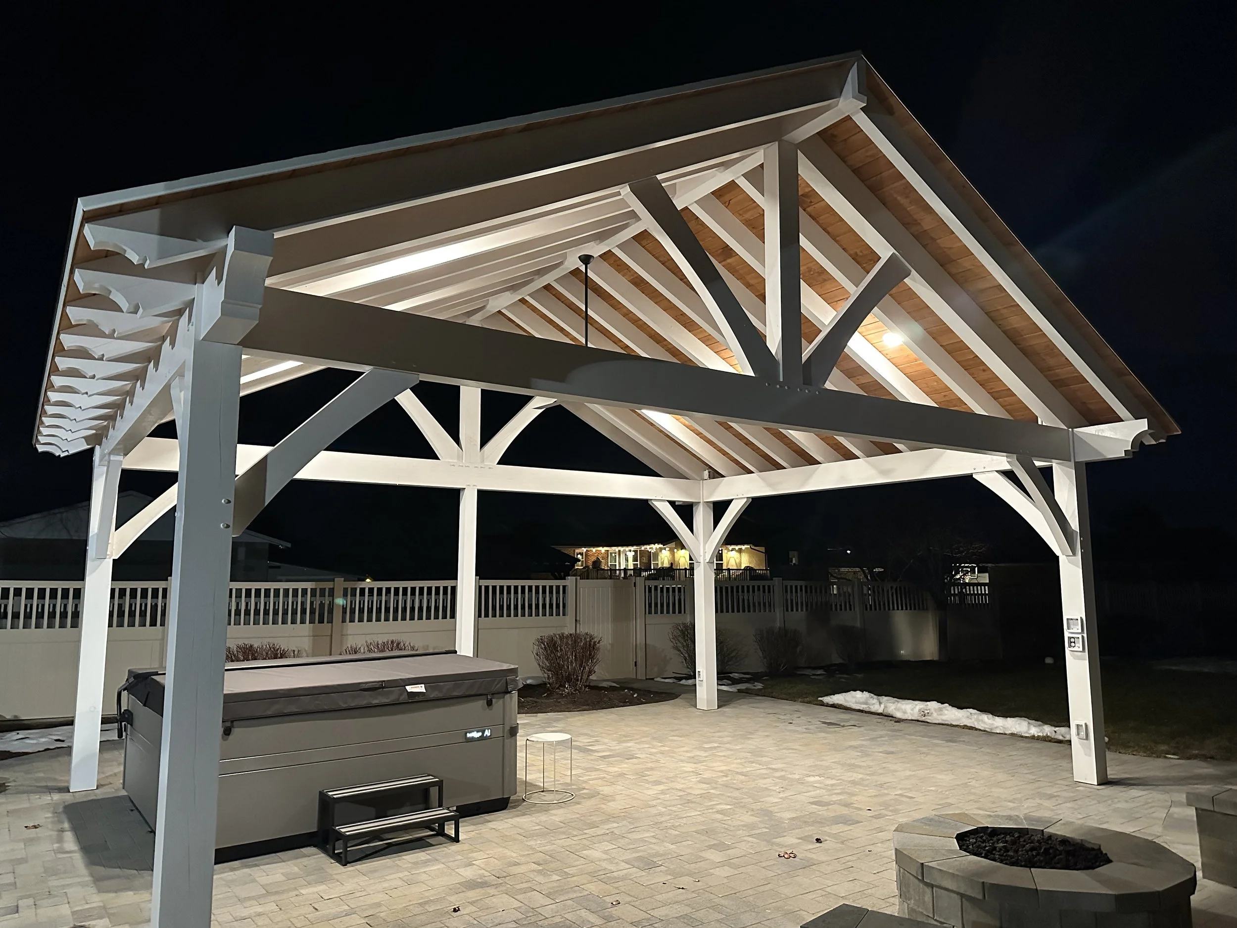 A backyard outdoor timber structure featuring our white timber beams and joinery.