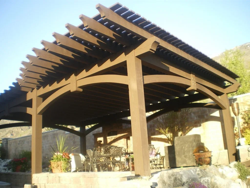  A rustic modern pergola build over the backyard patio.