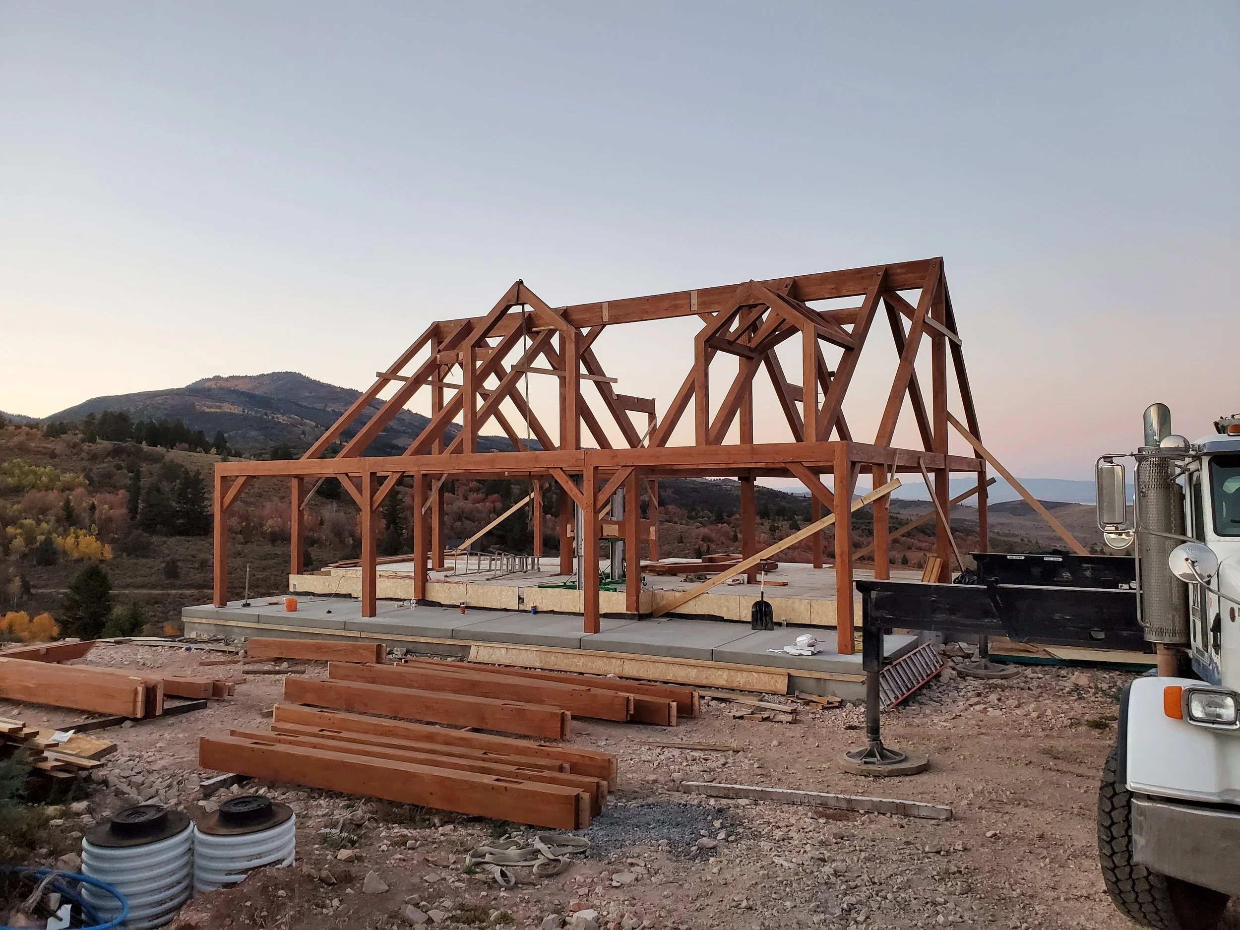 Construction site of our timber frames being installed with our team onsite. 