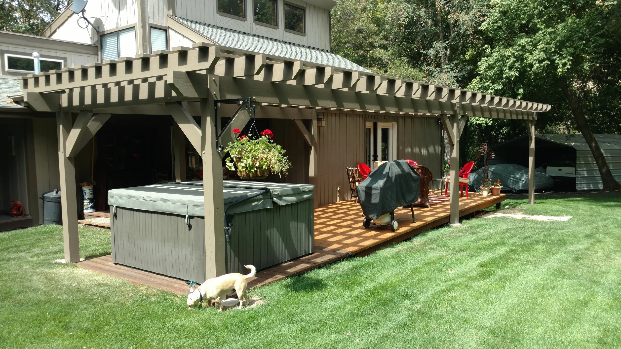 Custom layered timber pergola designed to elevate backyard outdoor living.