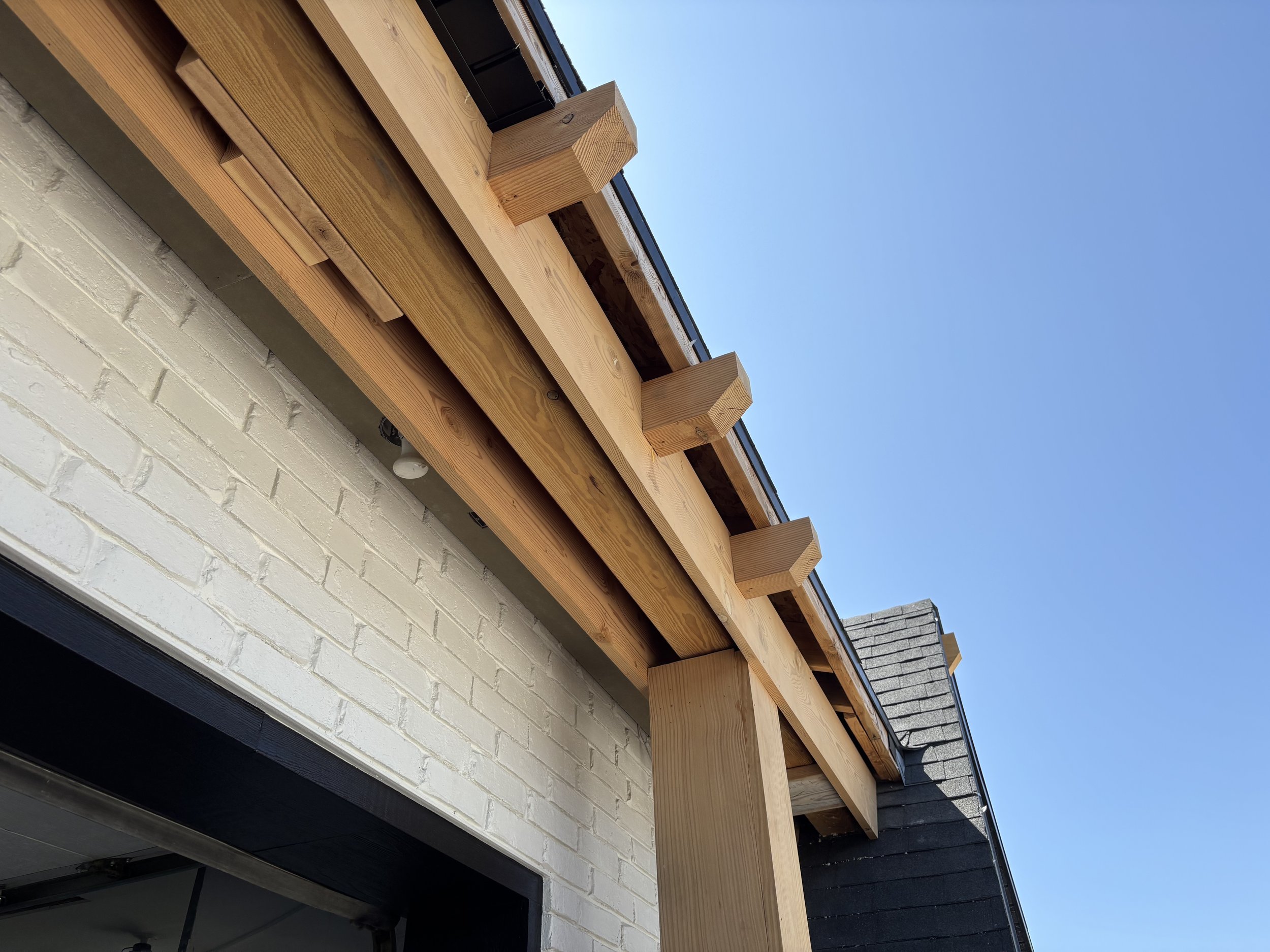 Two-car garage Front Timber Truss Install. 