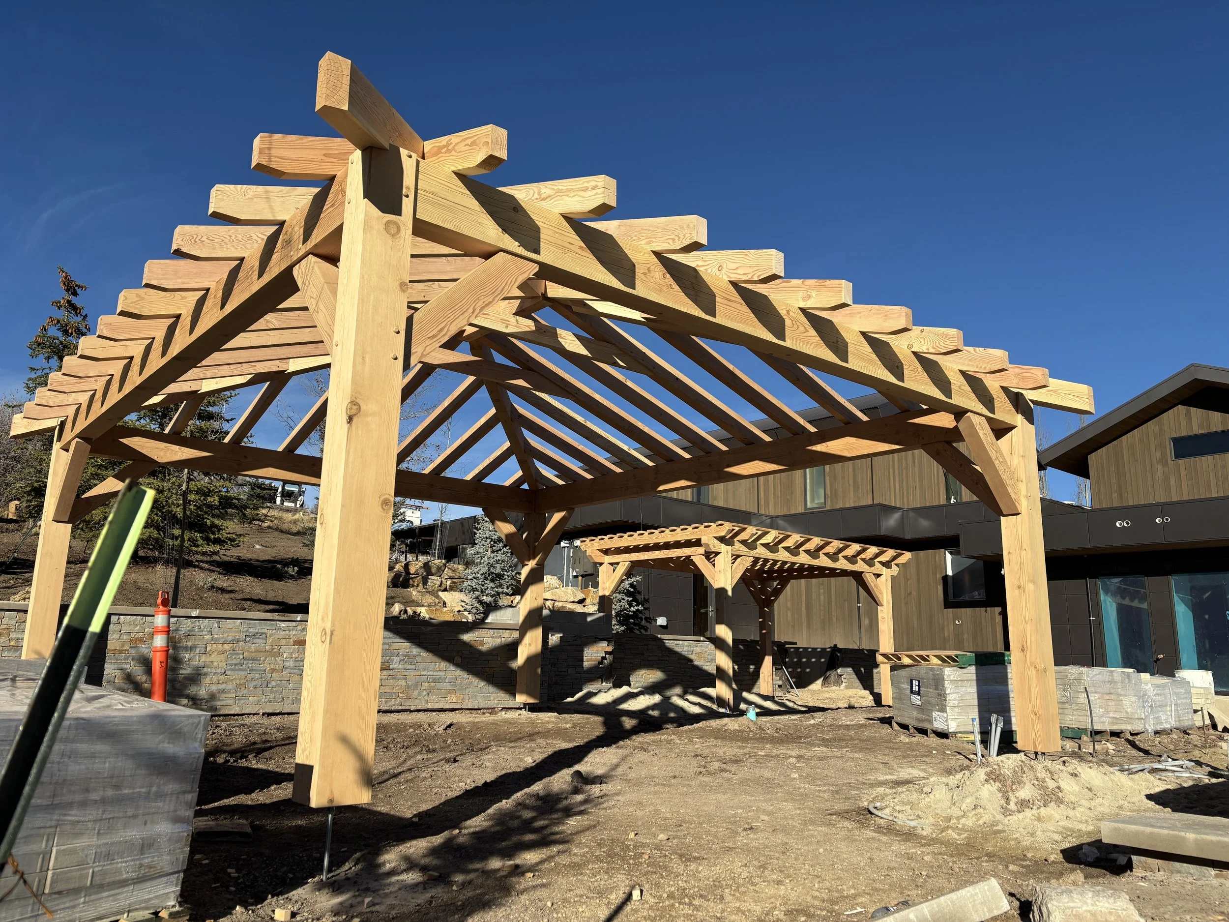Two wooden pergolas built for an install.   