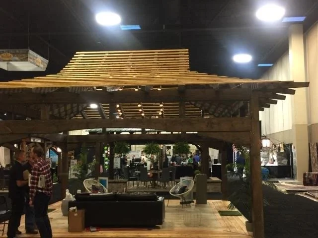 Indoor modern timber pergola at a convention. 
