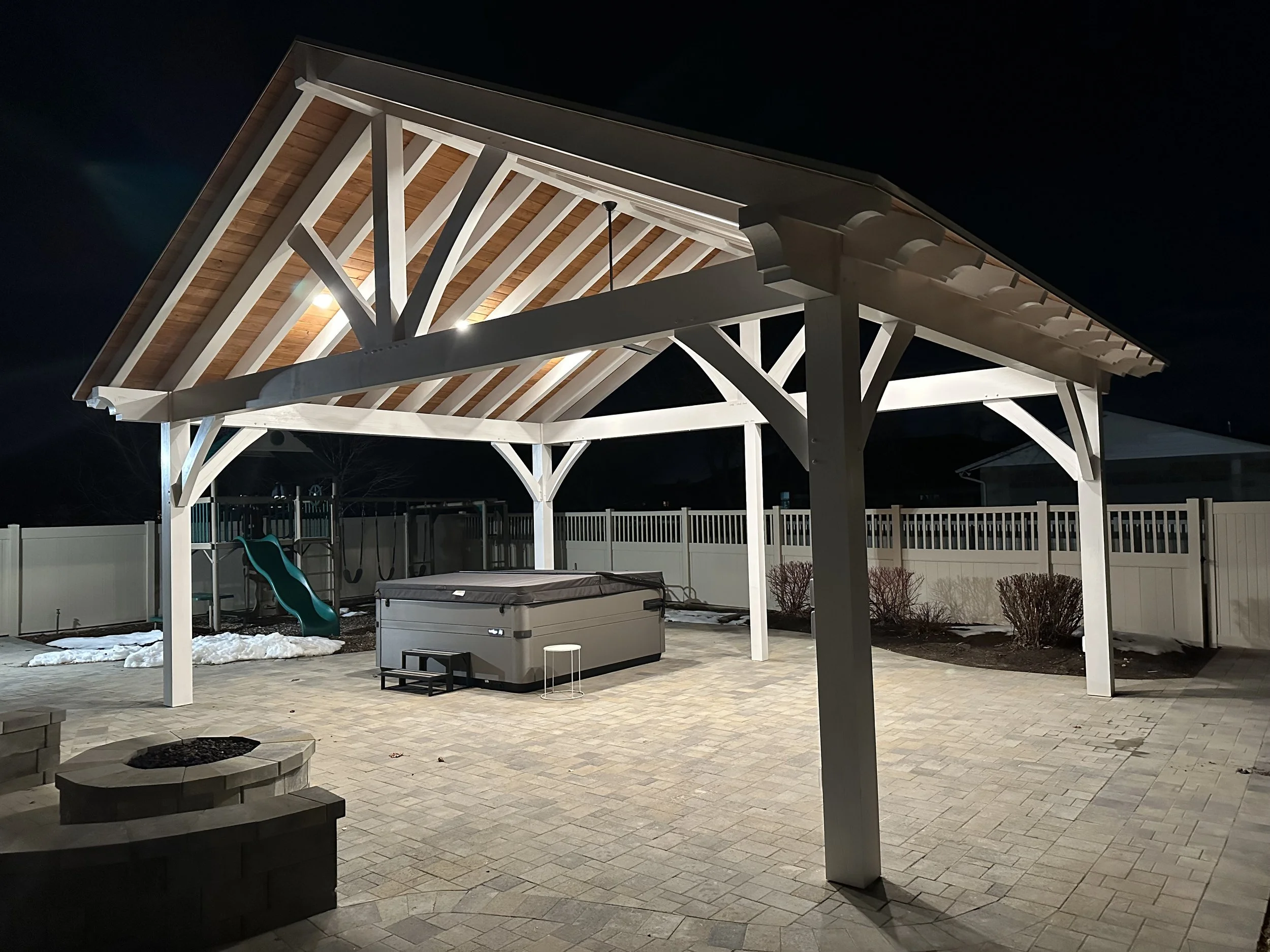 A backyard outdoor timber structure featuring our white timber beams and joinery.