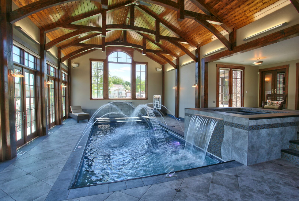 Indoor pool design with our wooden timber ceiling beams installed. 