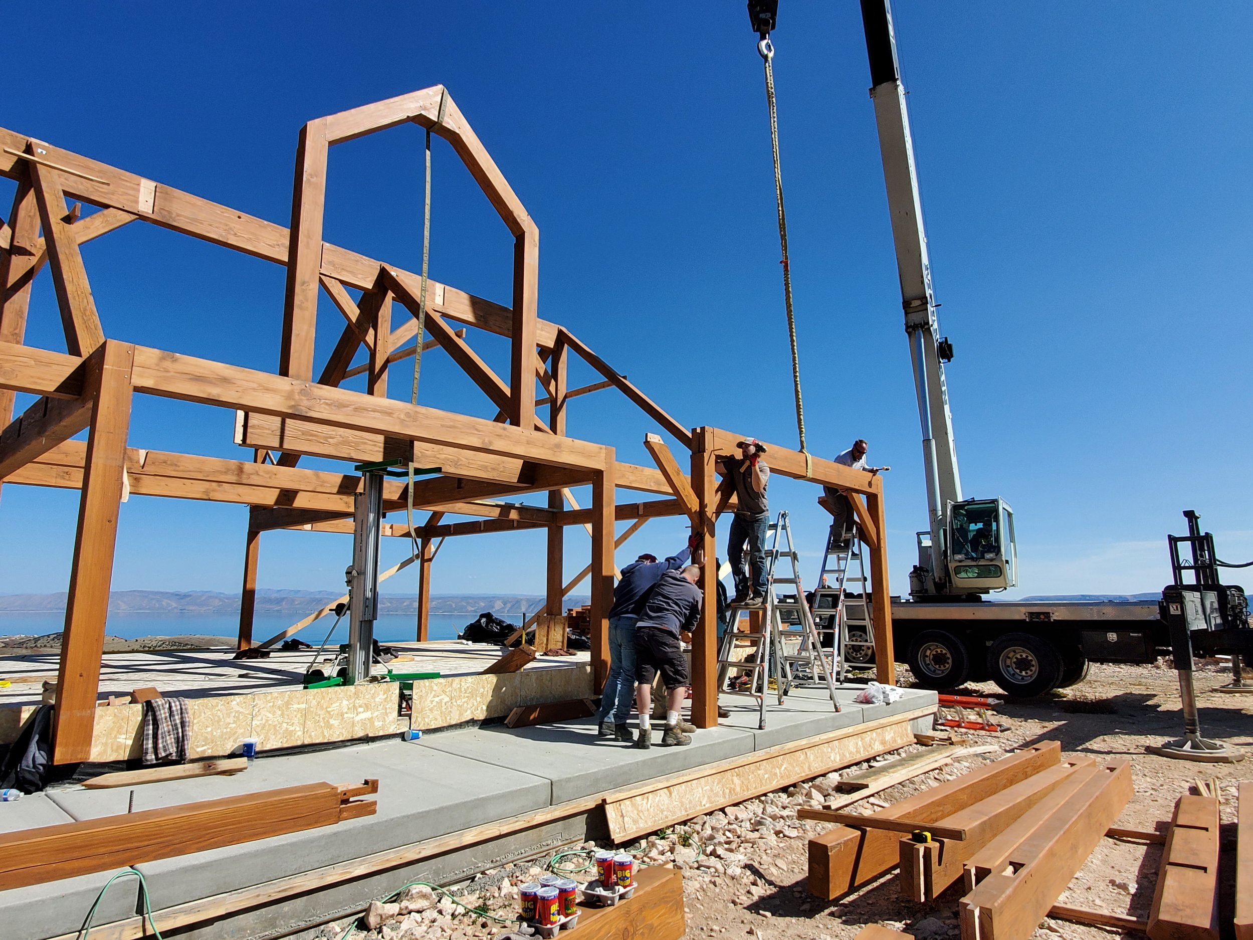Construction site of our timber frames being installed with our team onsite. 