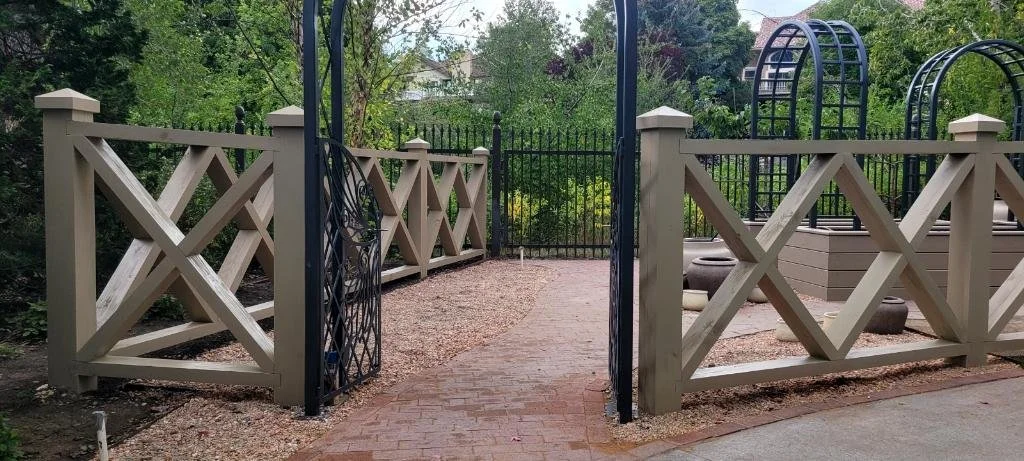 A park entrance with our timber fences and an arched trellis design.  
