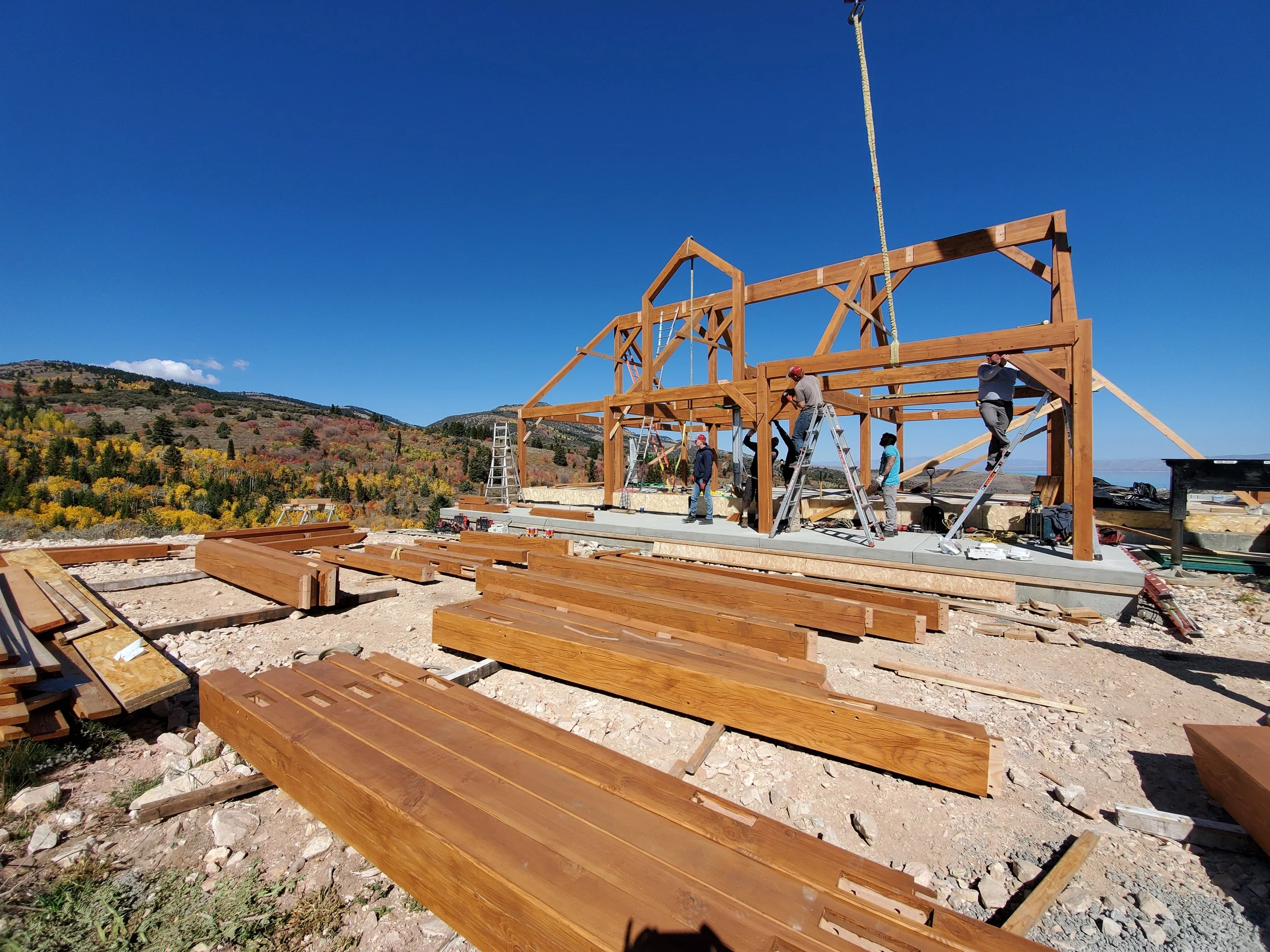 Construction site of our timber frames being installed with our team onsite. 