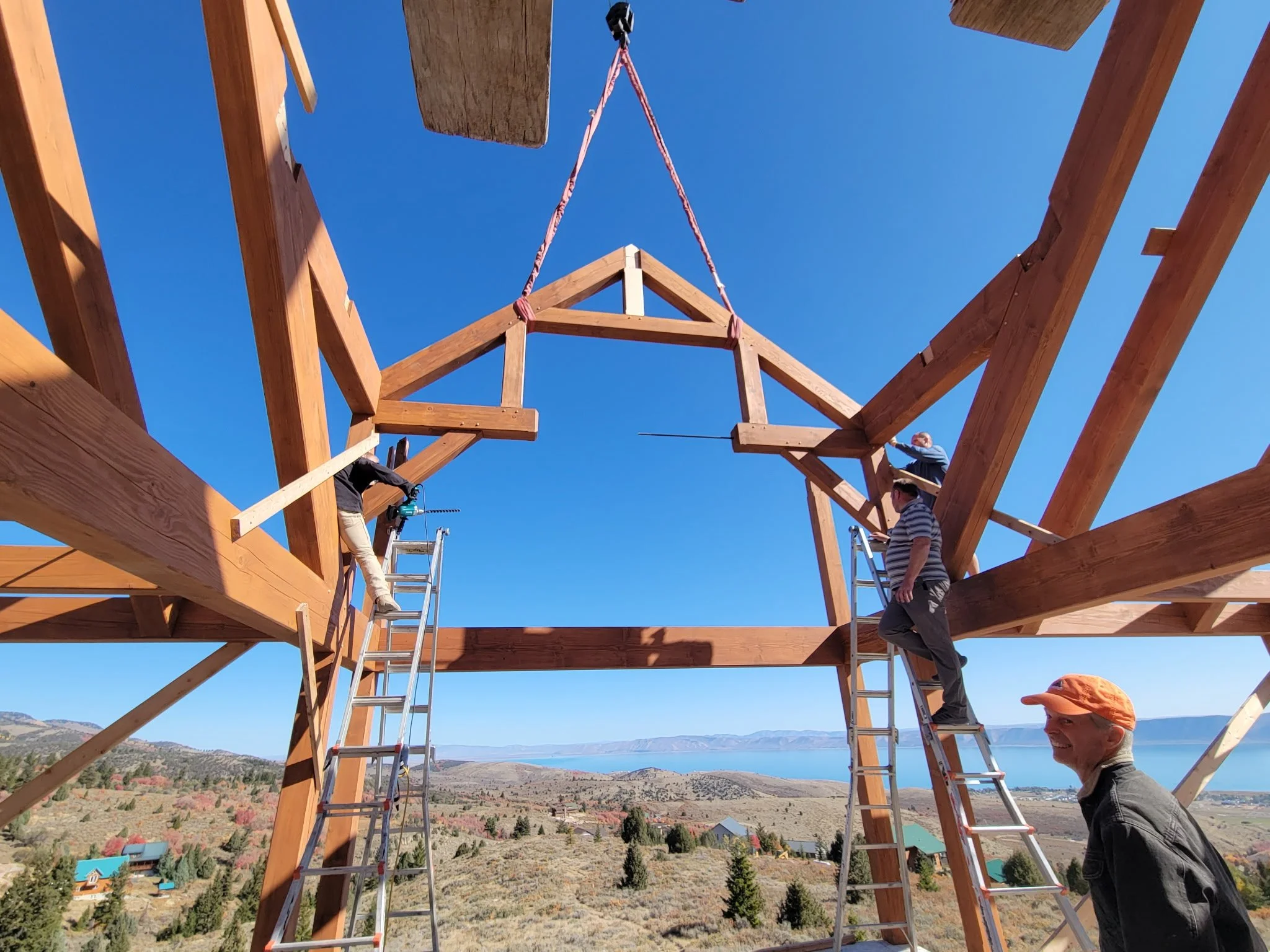 Construction site of our timber frames being installed with our team onsite. 