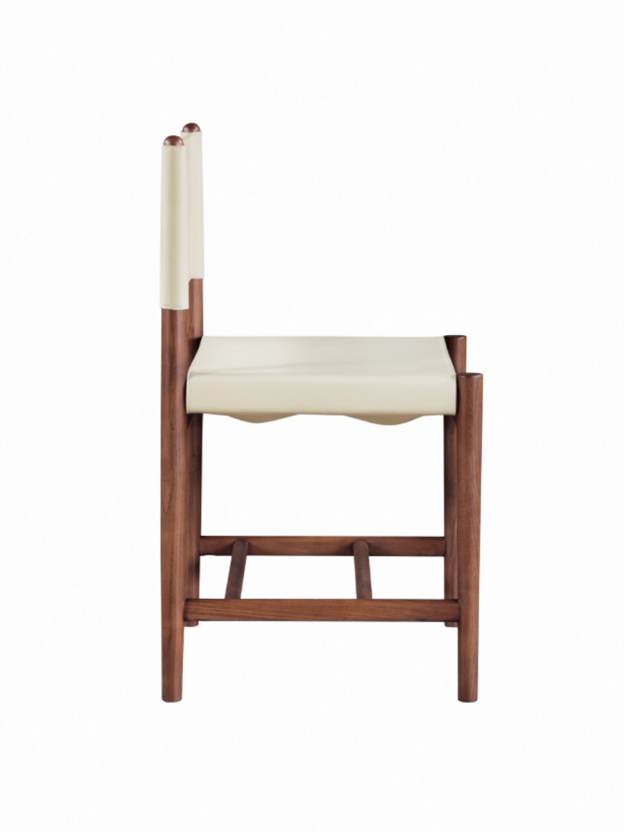 dining chair in soft cream vegan leather seat and back with brown walnut ash wood frame side view