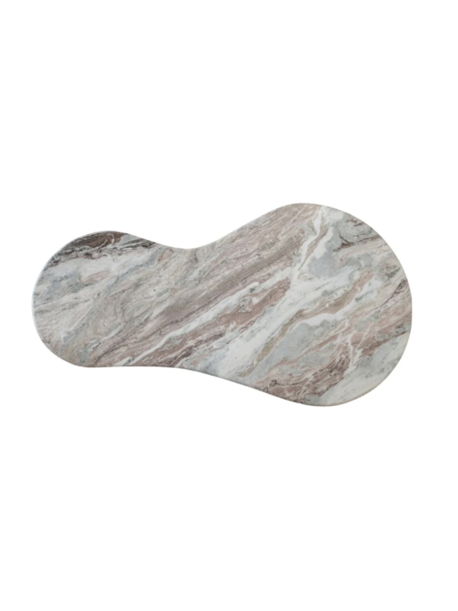 Modern sculptural console table featuring an asymmetrical, organically shaped white marble tabletop with subtle veining and two cylindrical dark wood pedestal legs. Top view.