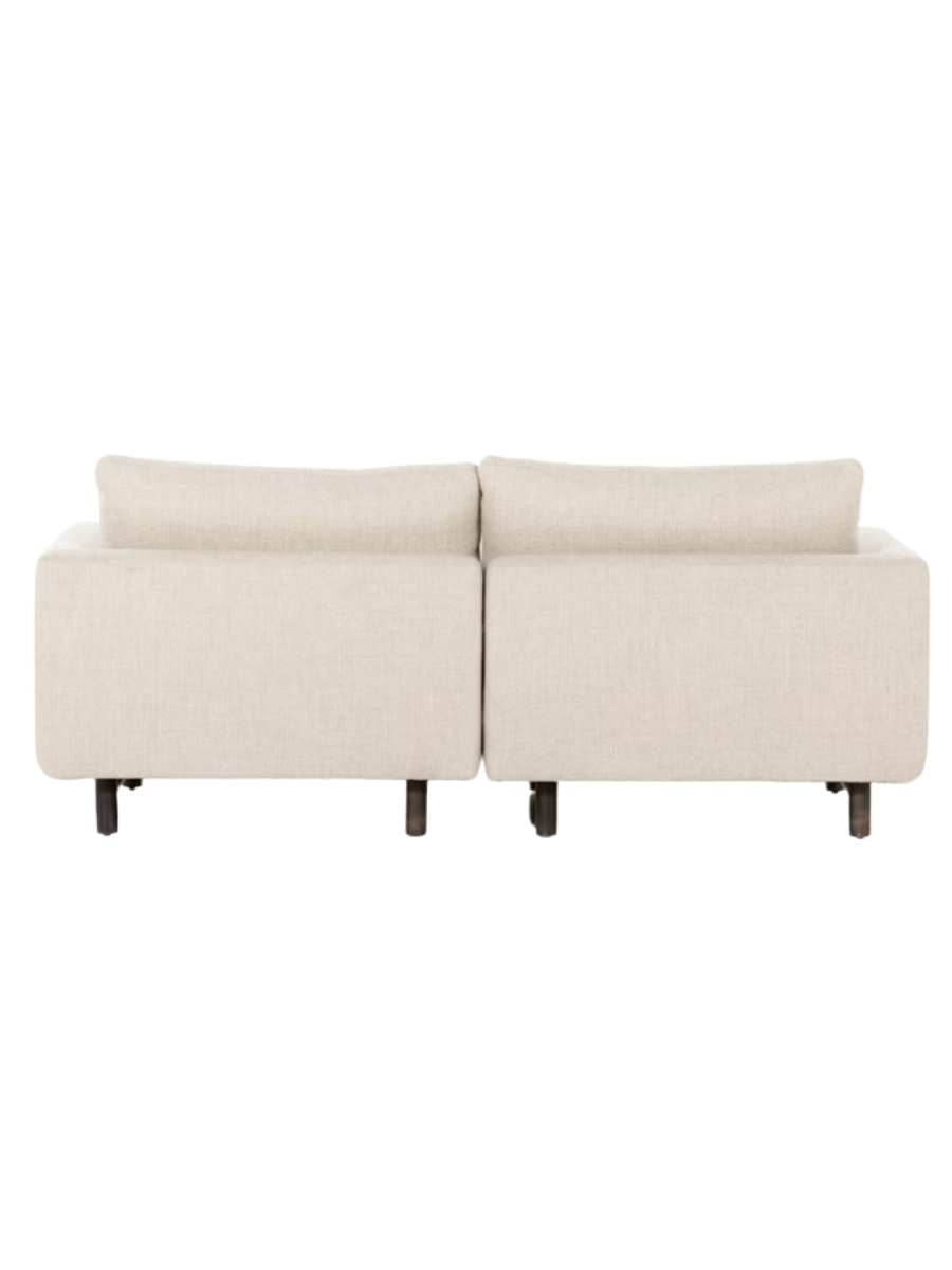 Modern two-piece sectional sofa upholstered in ivory textured fabric, featuring plush seat and back cushions, gently rounded arms, and short dark wood legs.