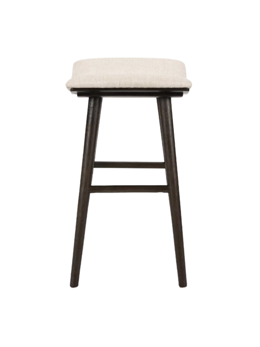 Saddle seat counter stool w/ cream / ivory / white upholstered seat and dark wood legs.