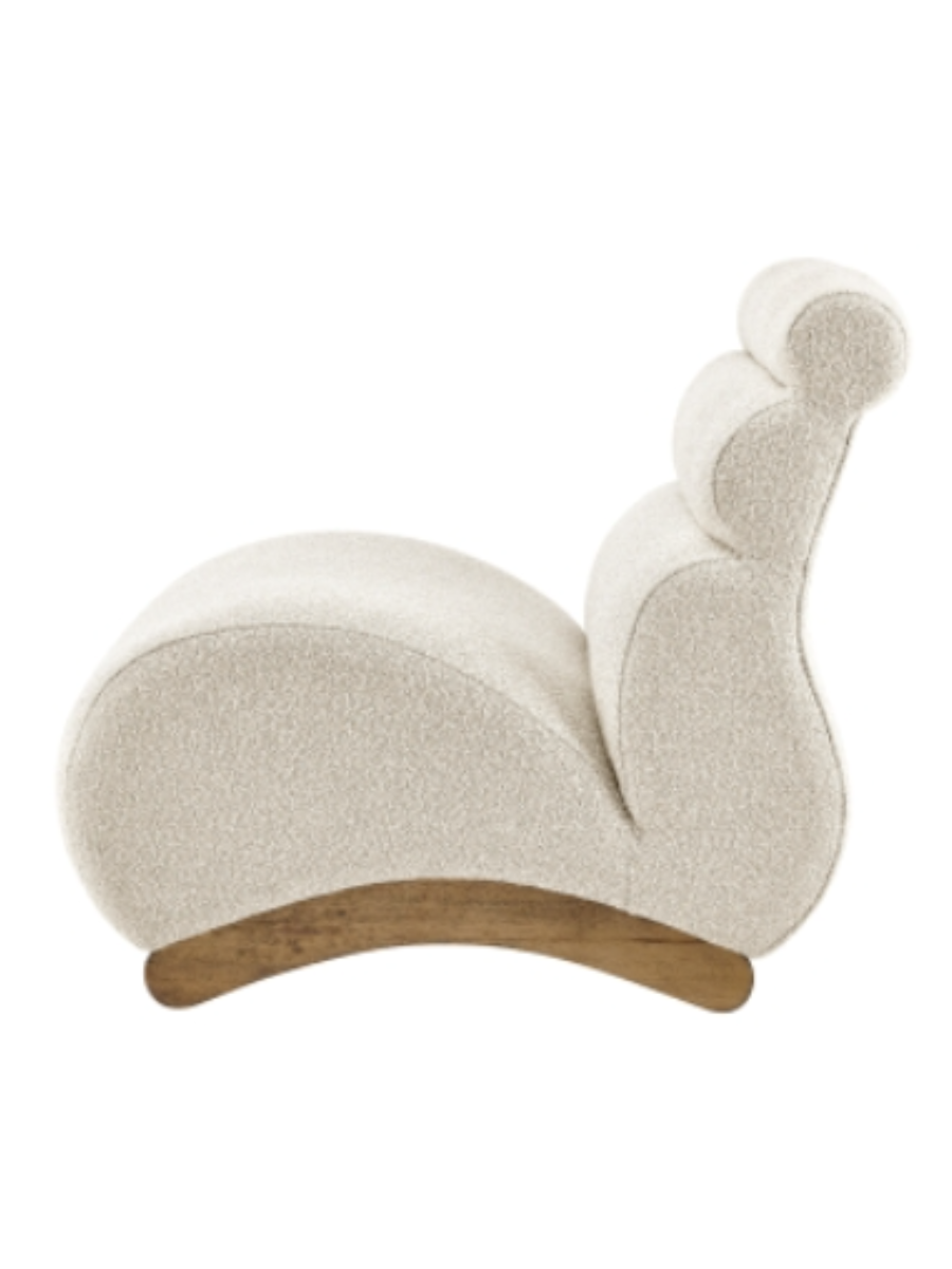 Modern armless accent chair upholstered in cream bouclé fabric, featuring a sculptural curved seat, channel-tufted backrest, and natural wood base.