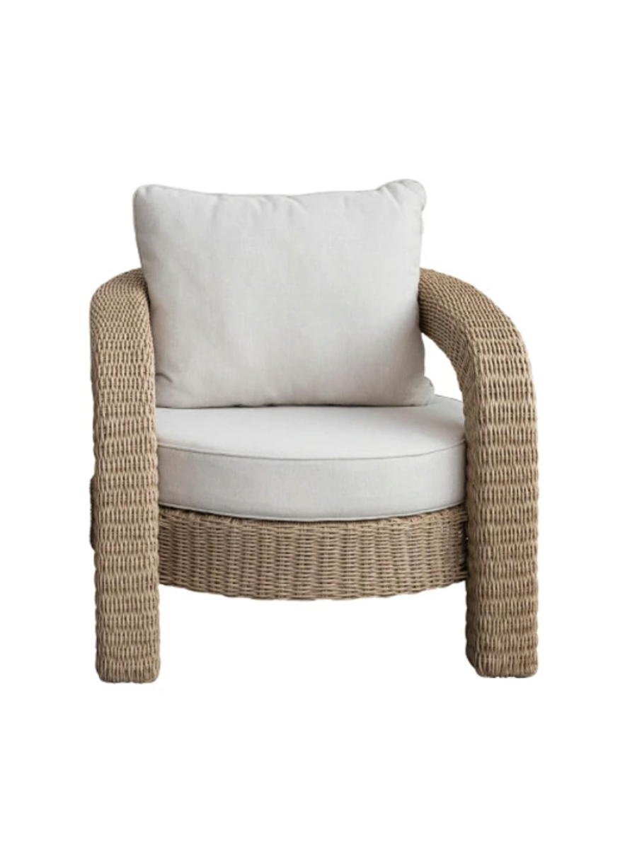 Hand-woven plastic wicker chair with cream cushions
