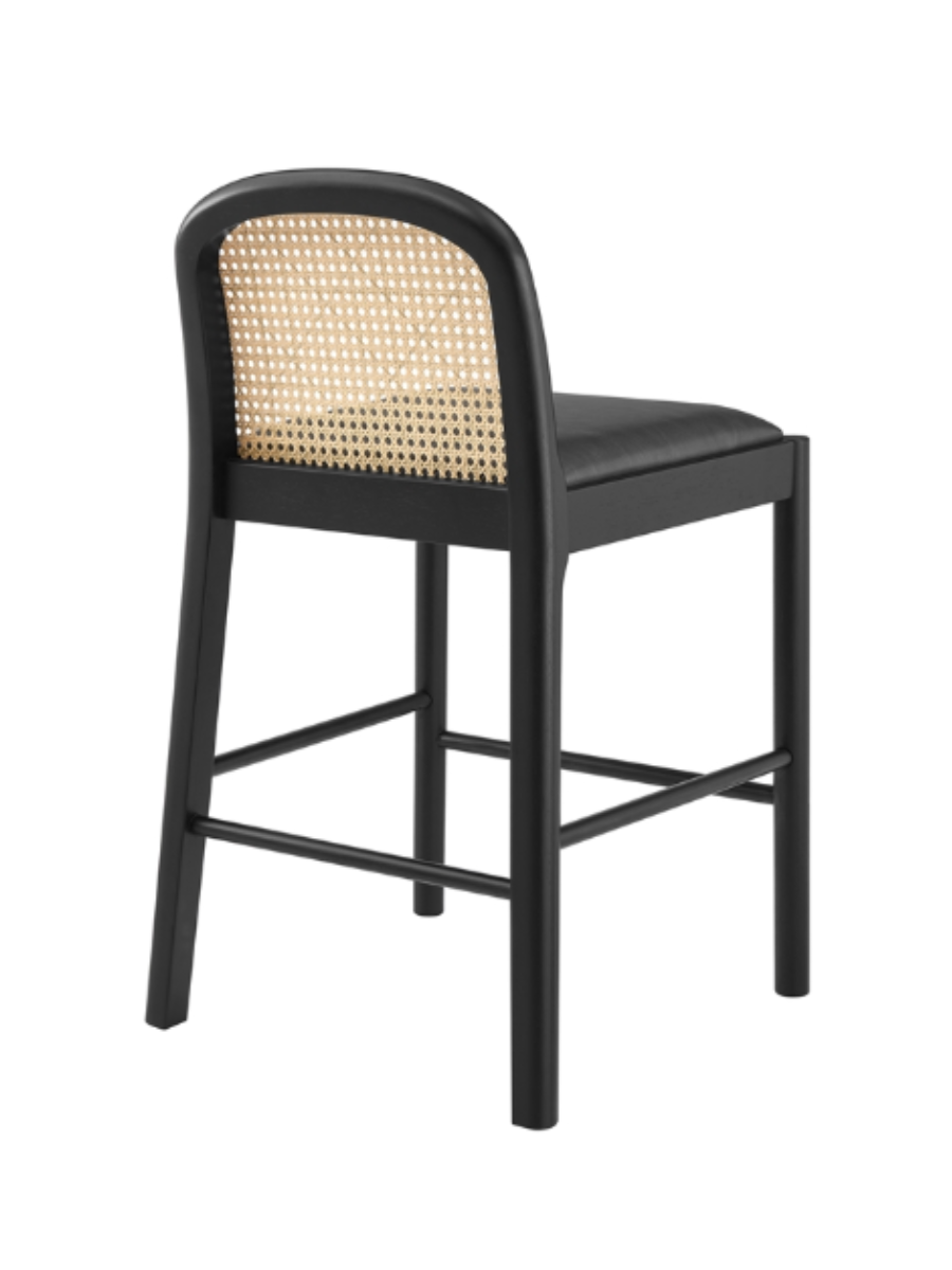 Black framed counter stool with black cushion seat and short rattan back rest