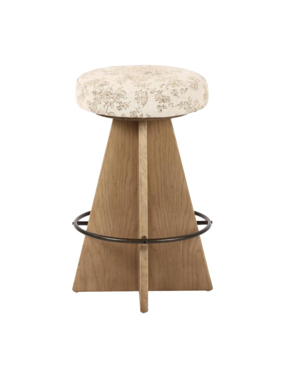Wood swivel counter stool with metal foot rest and floral upholstered seat.