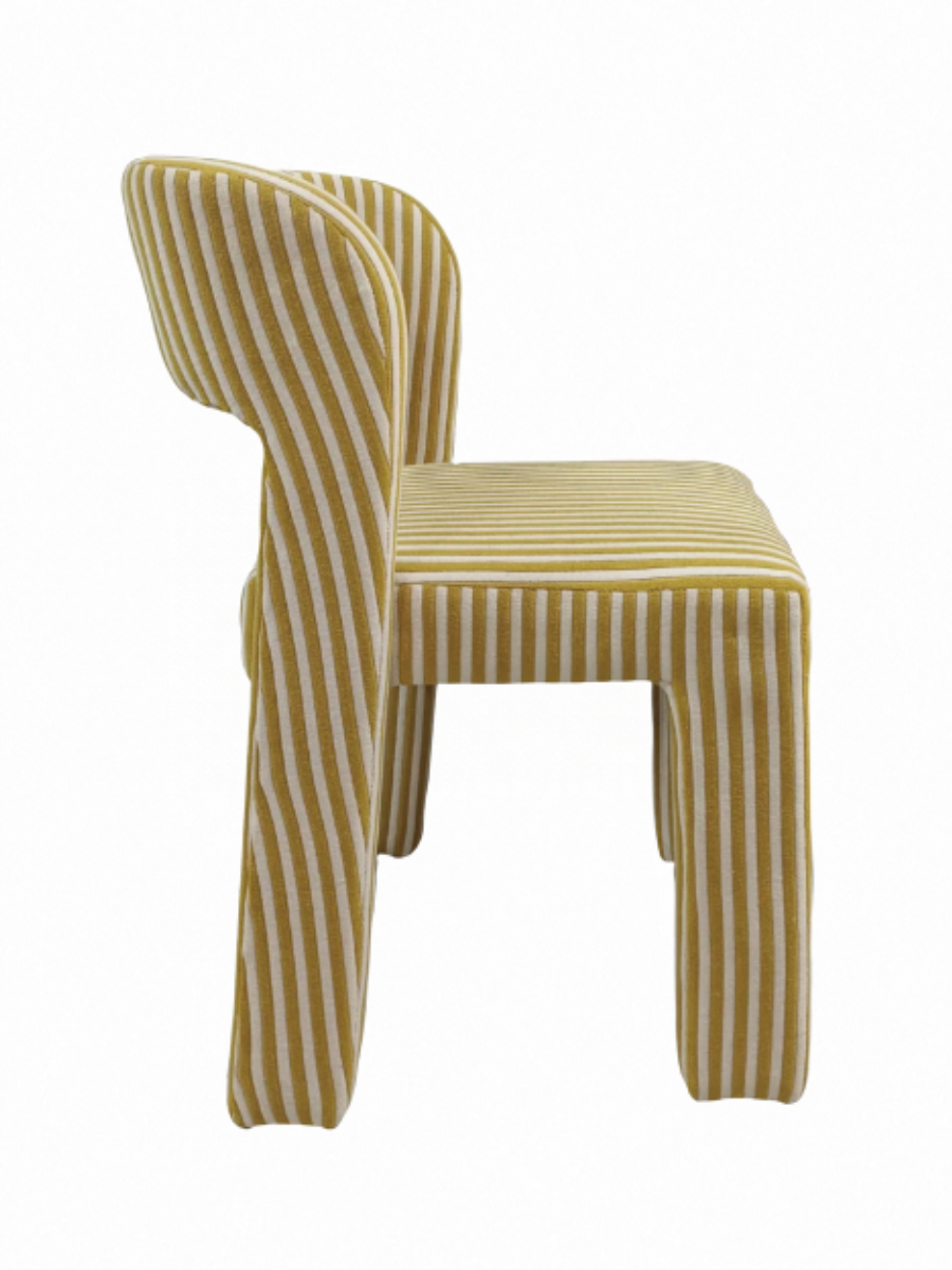 Modern upholstered armless dining chair with slim rounded barrel back in a yellow and white terrycloth + cotton striped pattern