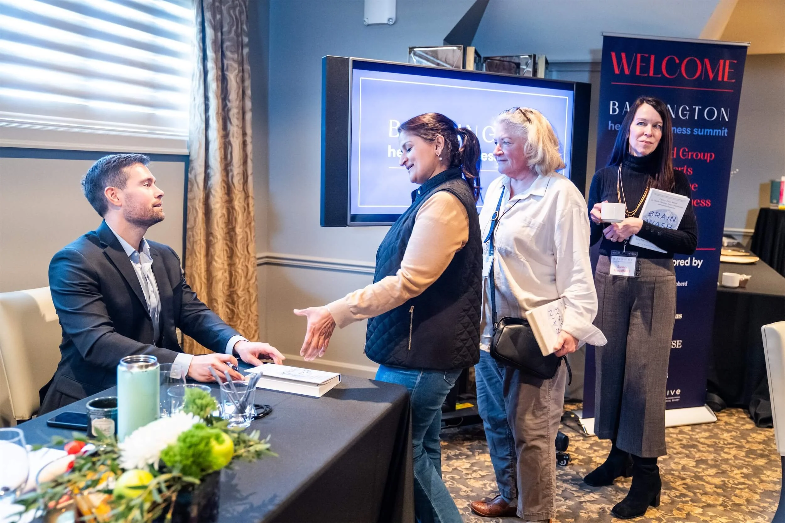 BHWS25 Perlmutter book sign line.jpg