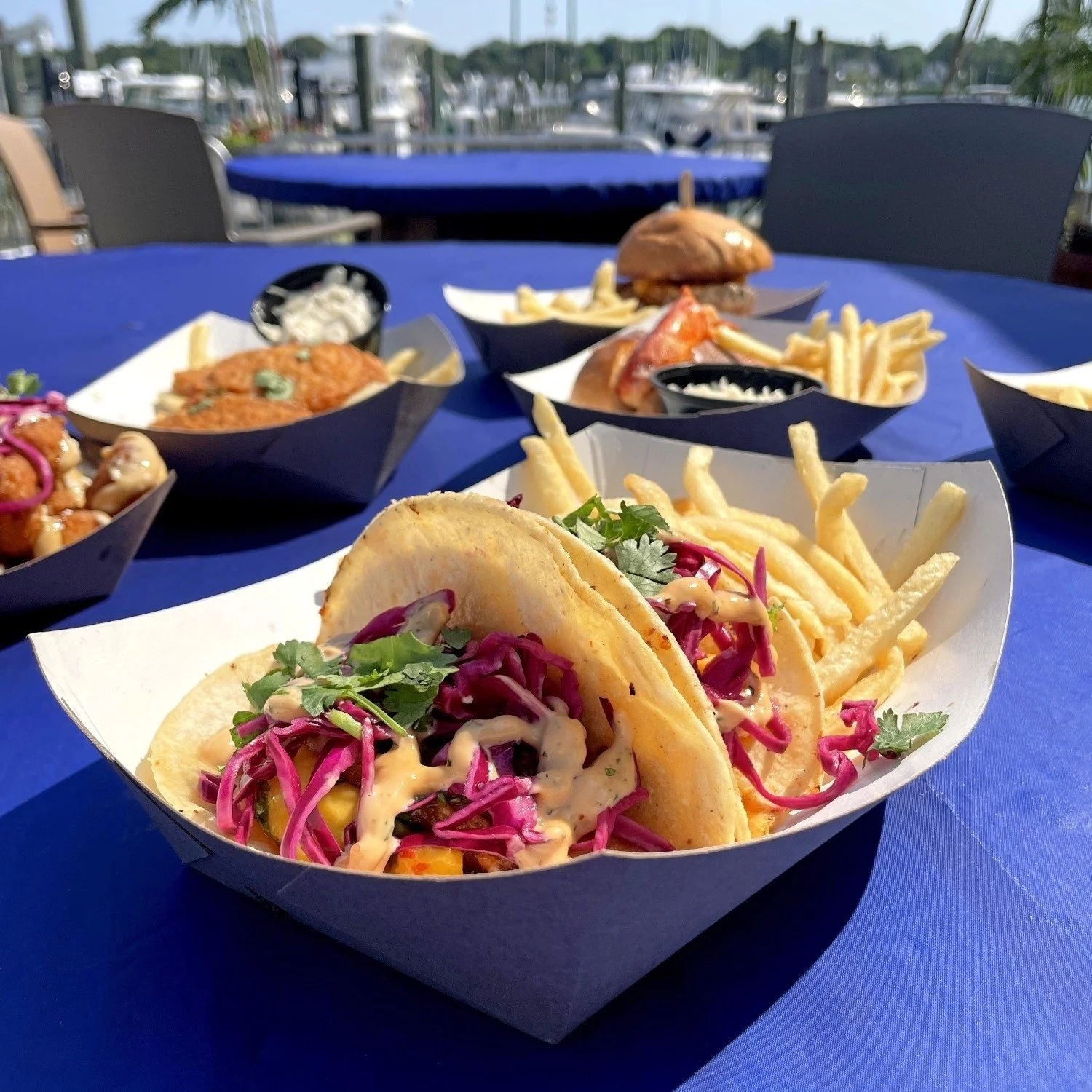 taco with variety of food in the distance