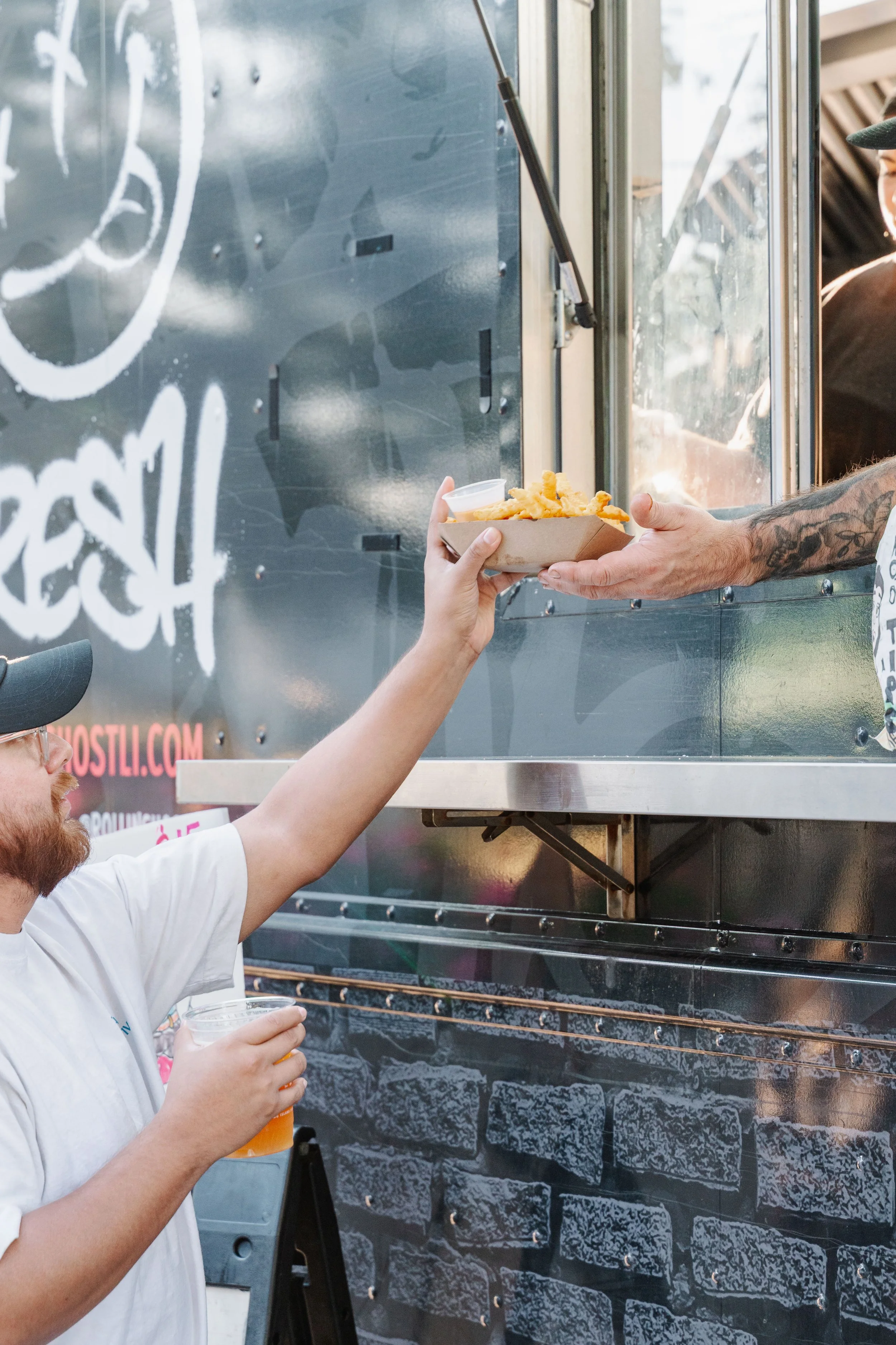 Rollin Ghost Employee Handing Food To Customer