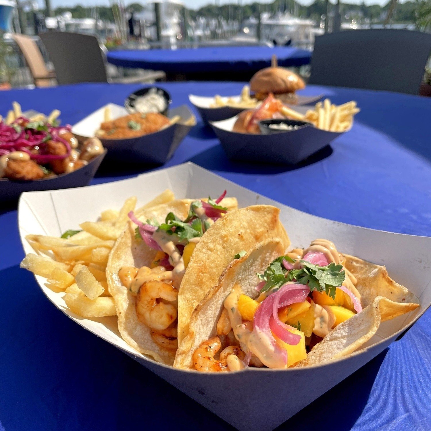 shrimp taco with fries pickled red onion and cilantro