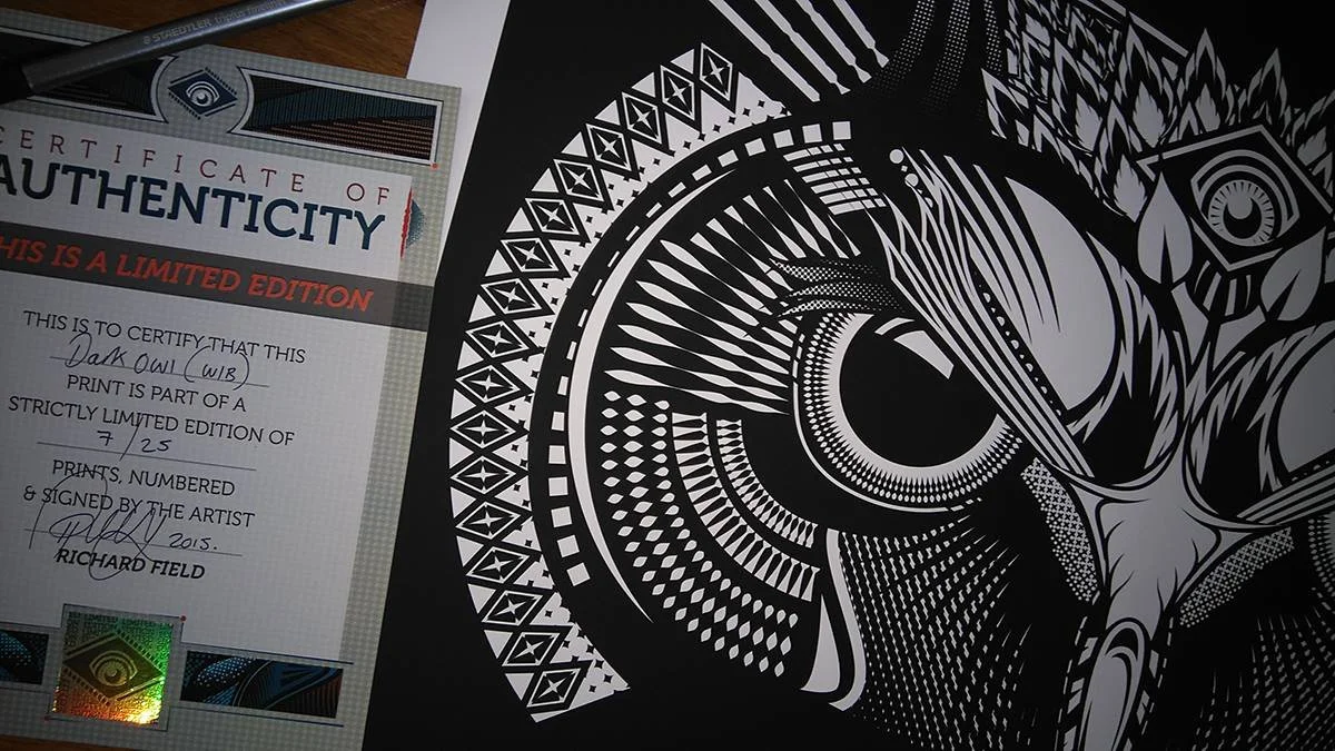 Close up photo of the Dark Owl White on black edition by Fieldinspired, signed, certified and printed on high quality Somerset Enhanced Velvet. Ready to be sent to a customer.