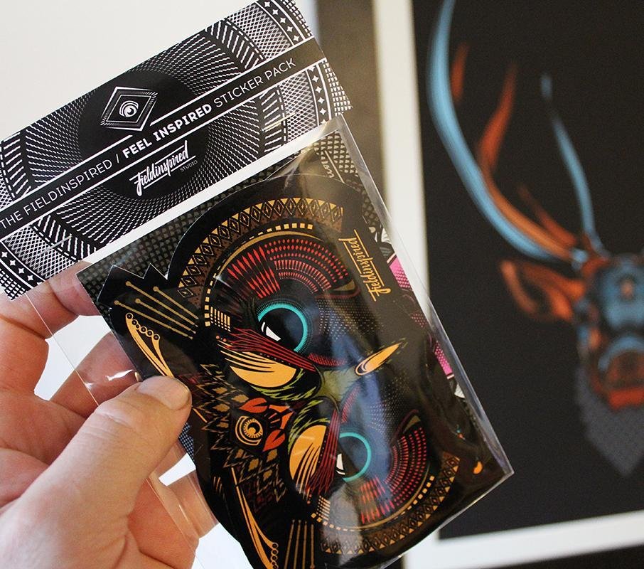 Person holding a pack of felt-inspired sticker patches with a holographic owl design, featuring geometric patterns and vibrant colors.