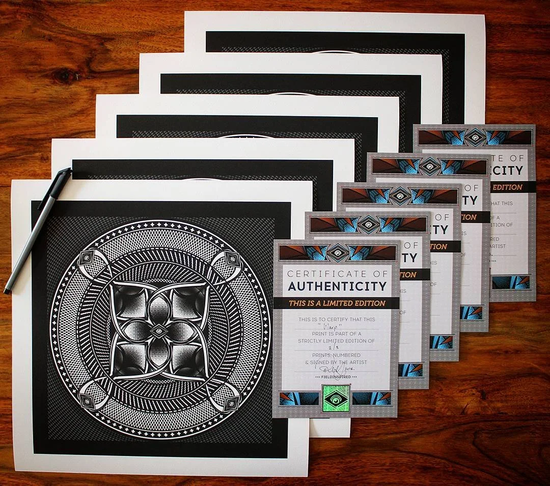 Multiple sheets of art prints by Fieldinspired along with certificates of authenticity.