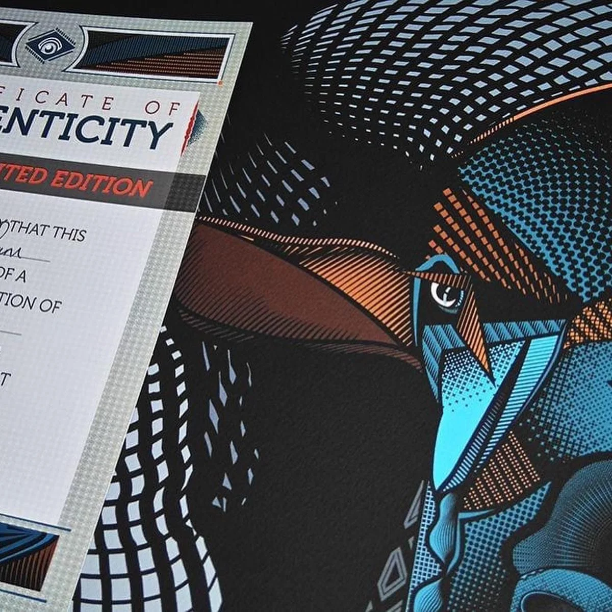 The image features a partial view of a certification of authenticity document with a comic book style background illustration of a masked character wearing a black hat and blue costume, with a color scheme of black, blue, and orange.
