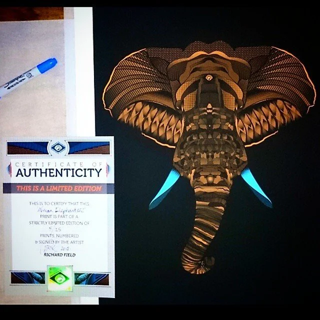 A digital artwork of an elephant with large, patterned ears, glowing blue tusks, and a detailed, textured body against a black background, next to a certificate of authenticity.