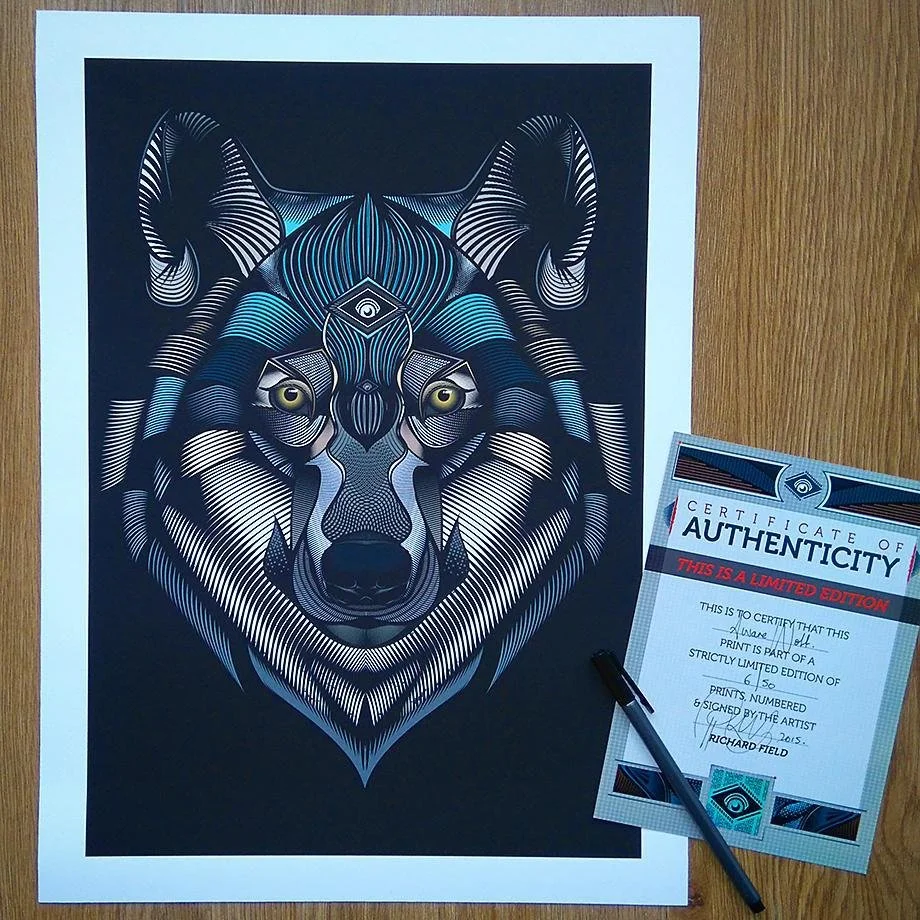A detailed illustration of a wolf's face with geometric and line patterns, accompanied by a certificate of authenticity and a black pen.