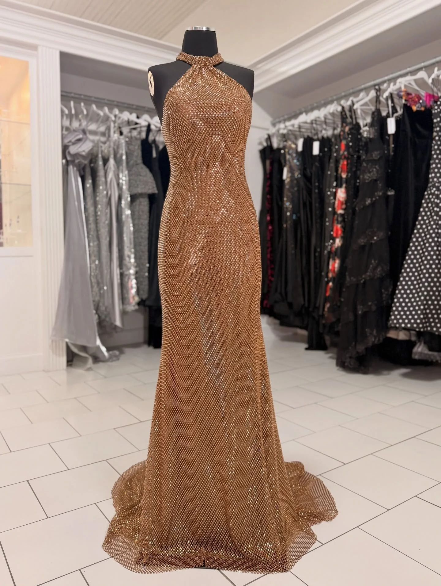 Our very own Golden Globe statue, brought to life ✨
Liquid gold, sculpted to perfection, and utterly one of a kind.
For the girl who does not attend the event&hellip; she is the event. #prom #promdress #promshopping #formal #formalwear #gown #couture