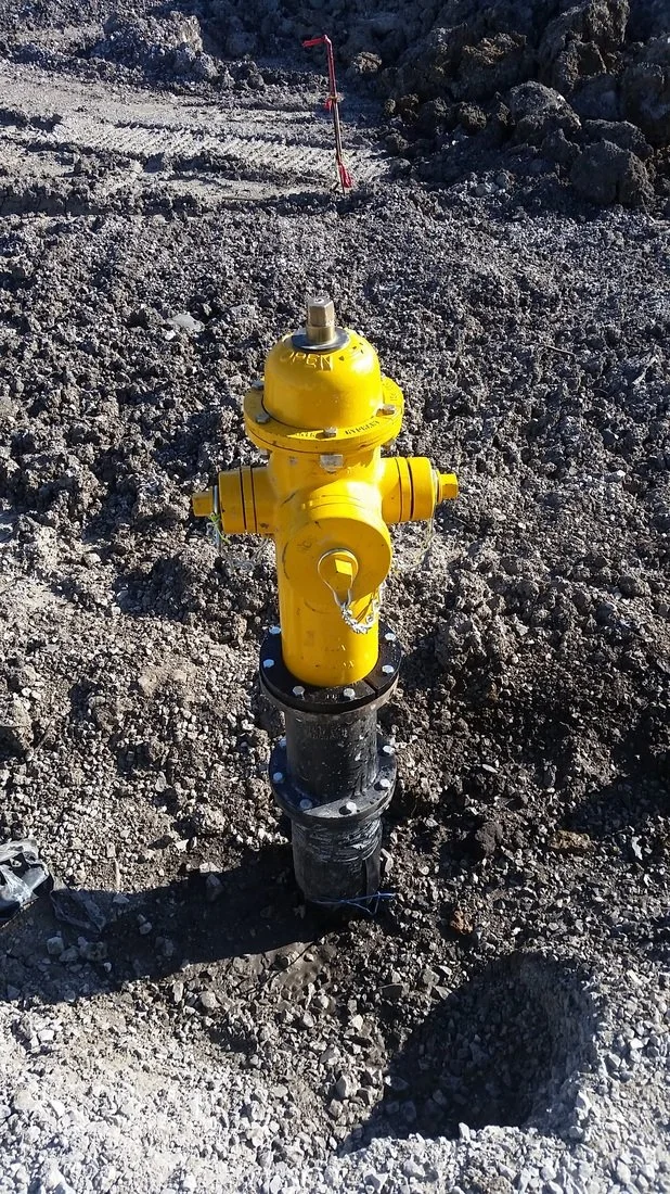 Newly installed fire hydrant on an active job site.