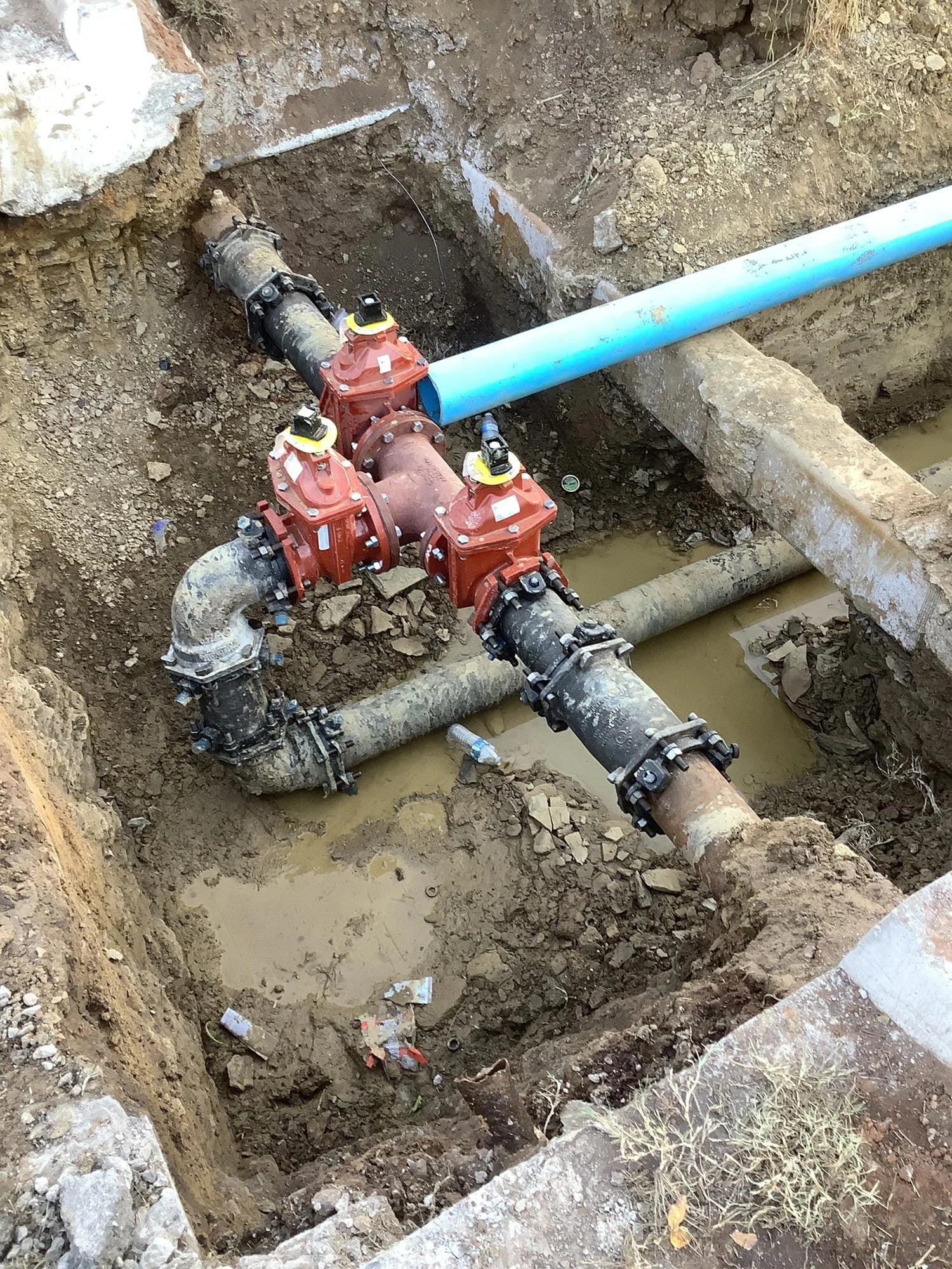 Underground waterline and fire hydrant installation for Black Wall Street Square residential infrastructure project in Tulsa Oklahoma