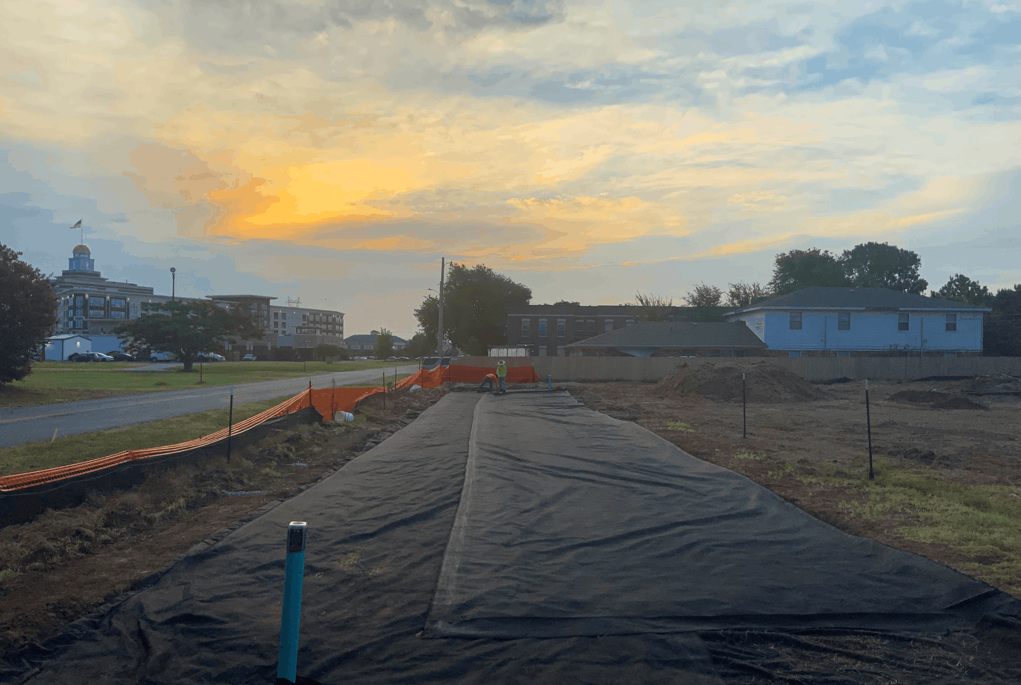 Geotextile fabric installed over prepared drainage area