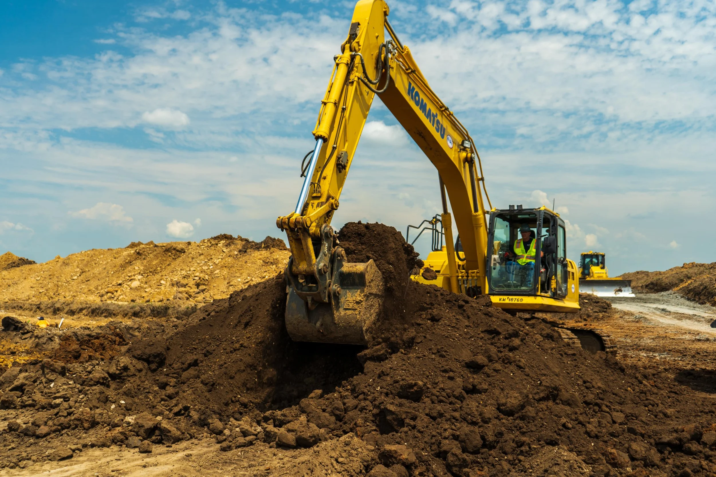 An excavator moving dirt